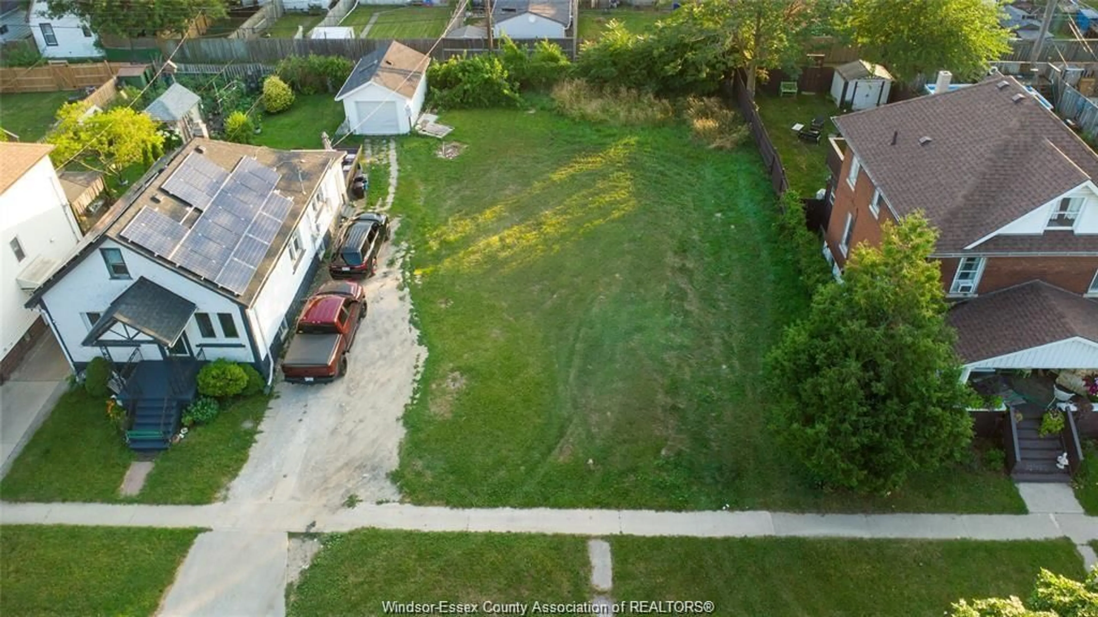 Frontside or backside of a home, the fenced backyard for 1059 ALBERT, Windsor Ontario N8Y 3P4