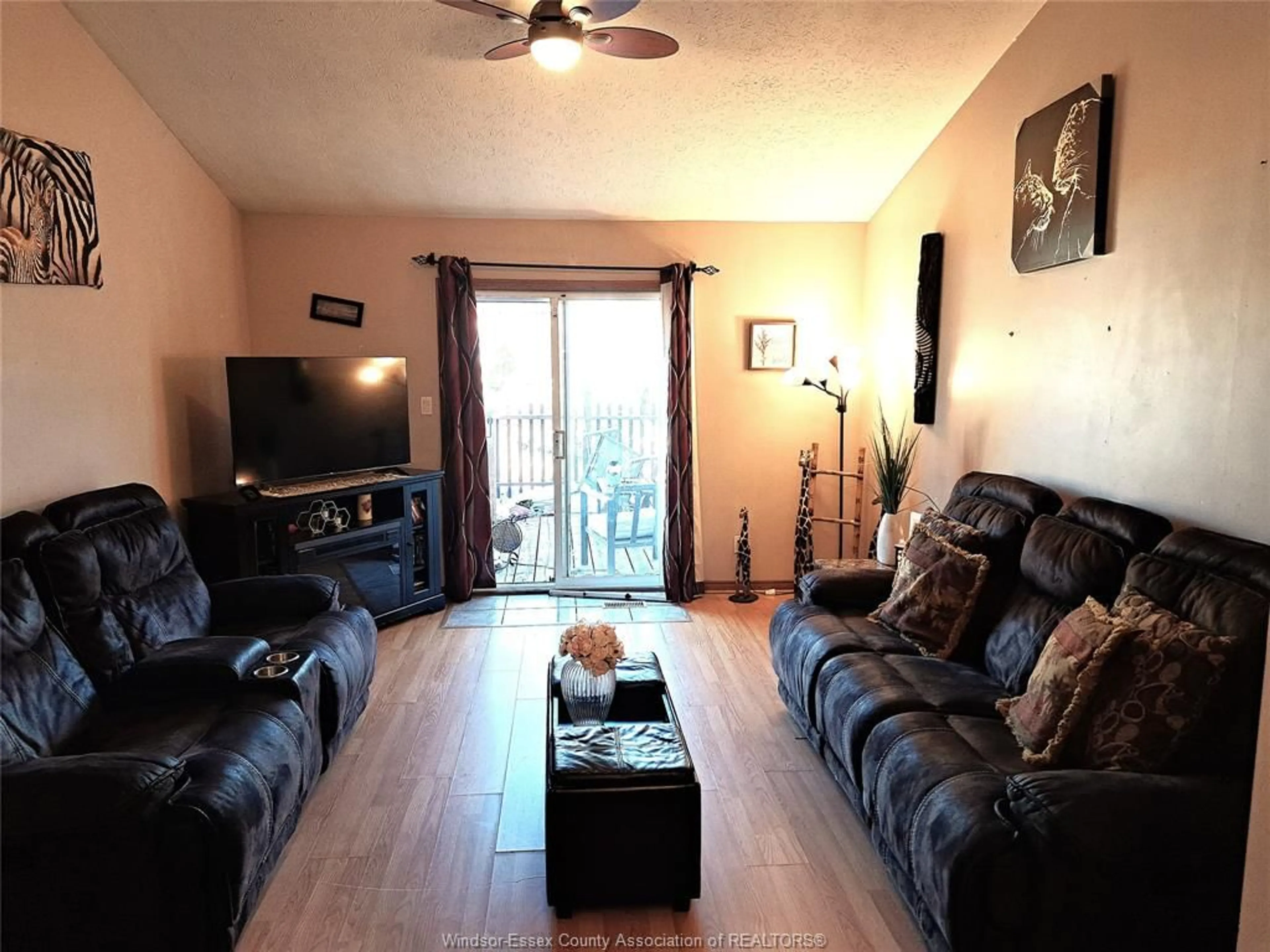 Living room, wood floors for 54 SUTTON Dr, Leamington Ontario N8H 5C8