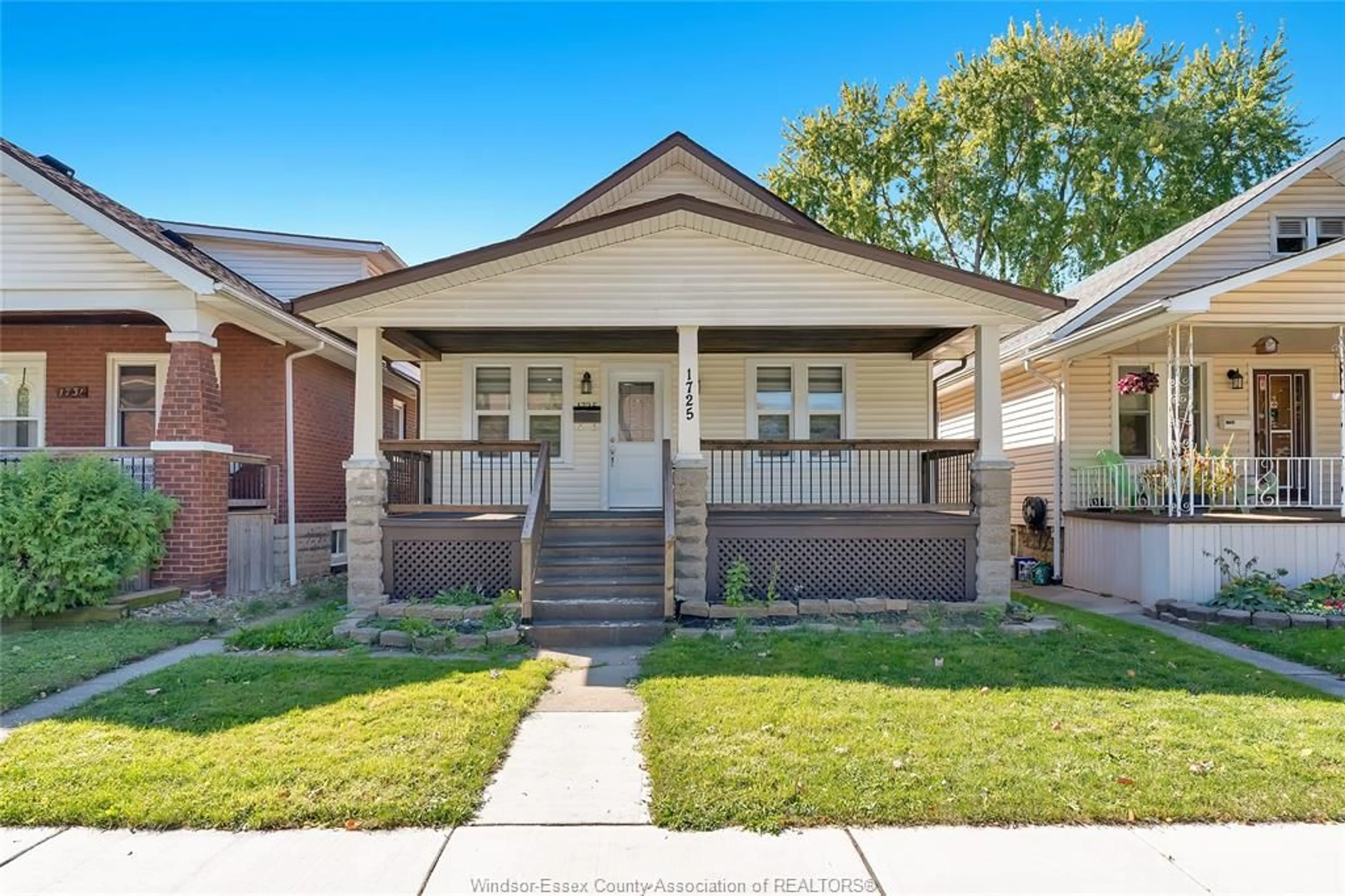 Frontside or backside of a home, the fenced backyard for 1725 LINCOLN Rd, Windsor Ontario N8W 2G6