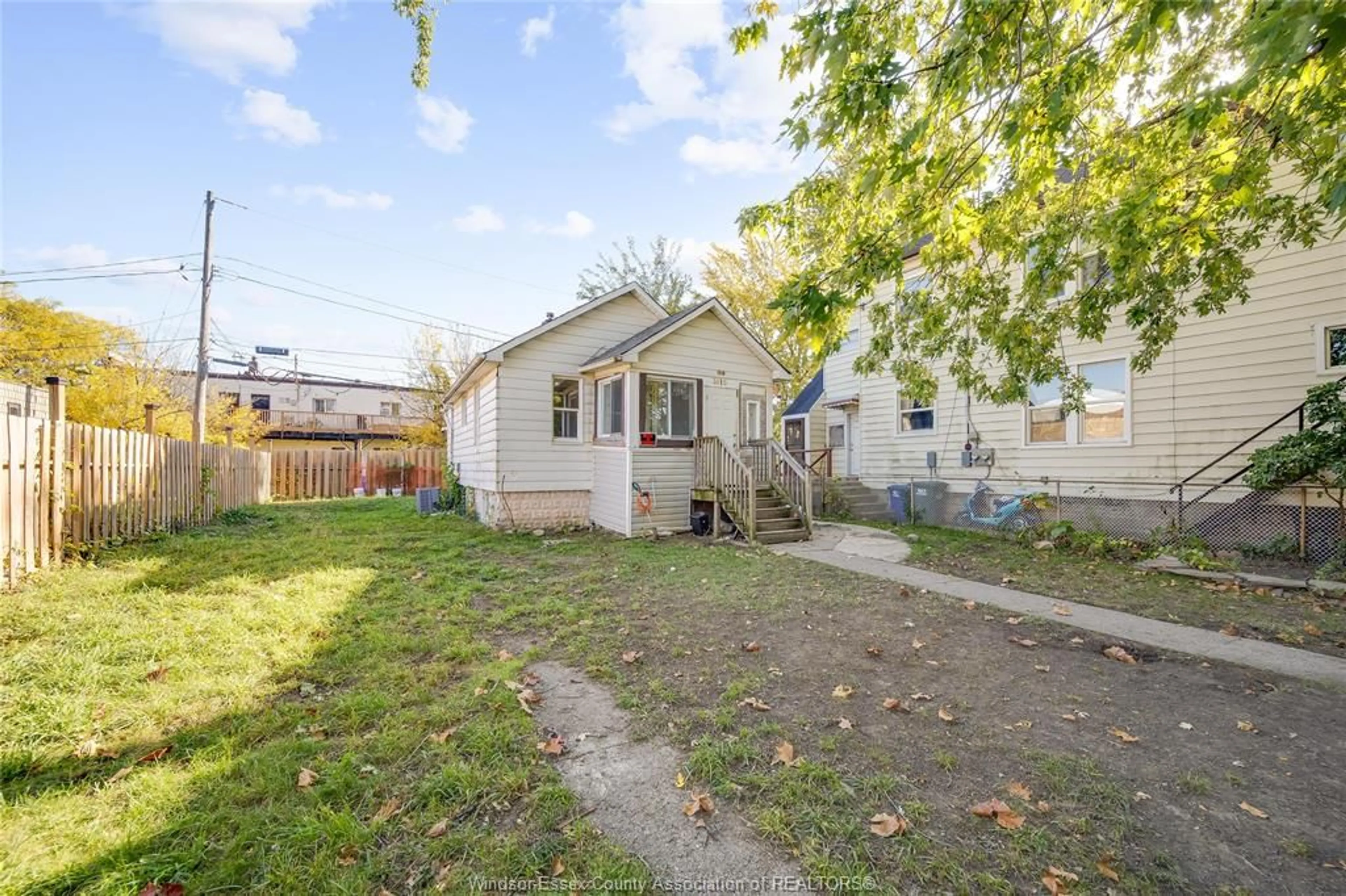 Frontside or backside of a home, the fenced backyard for 1016 HICKORY, Windsor Ontario N8Y 3S1