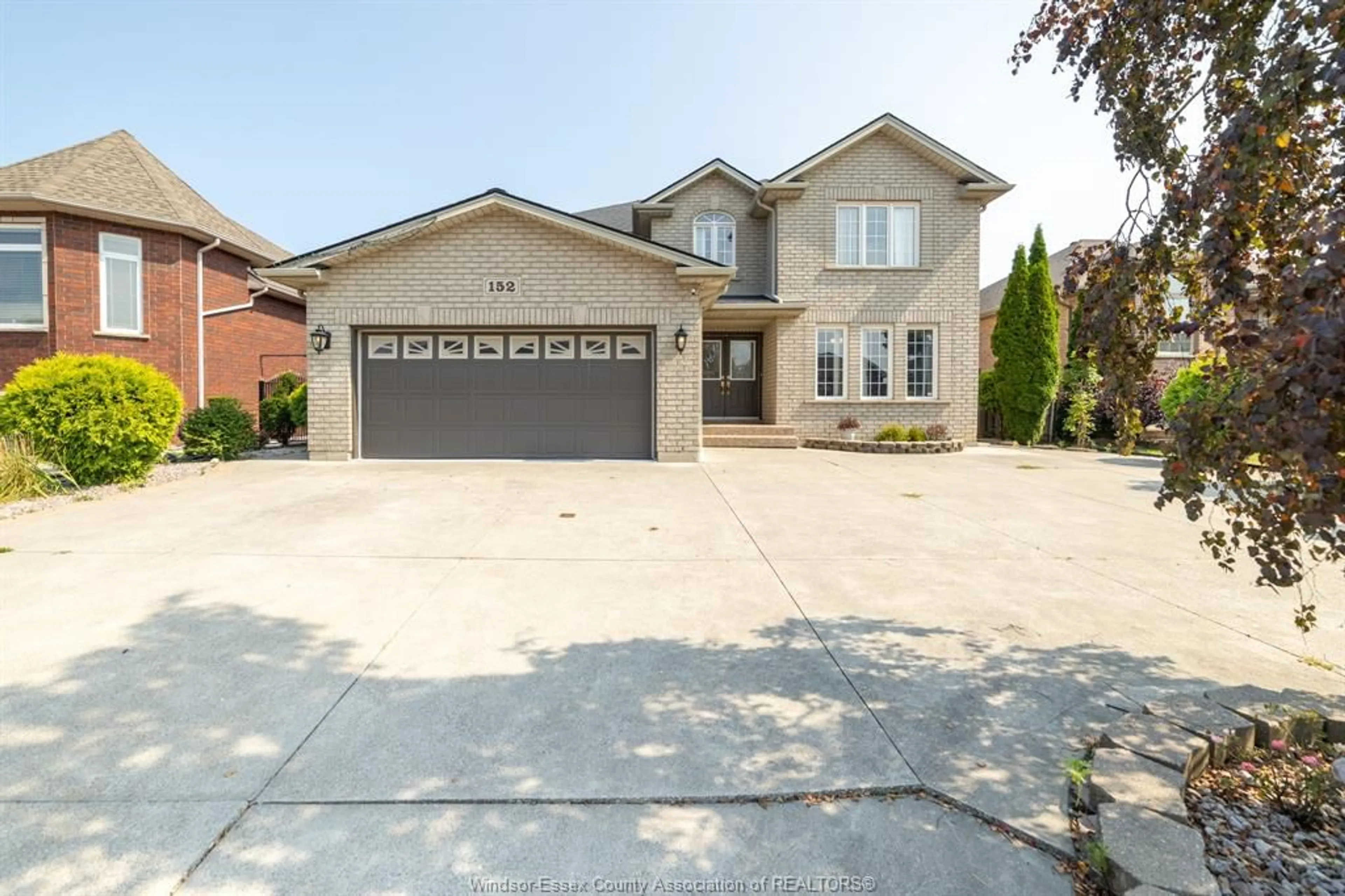 Frontside or backside of a home, the street view for 152 SHADY SPRING Cres, Lakeshore Ontario N0R 1A0