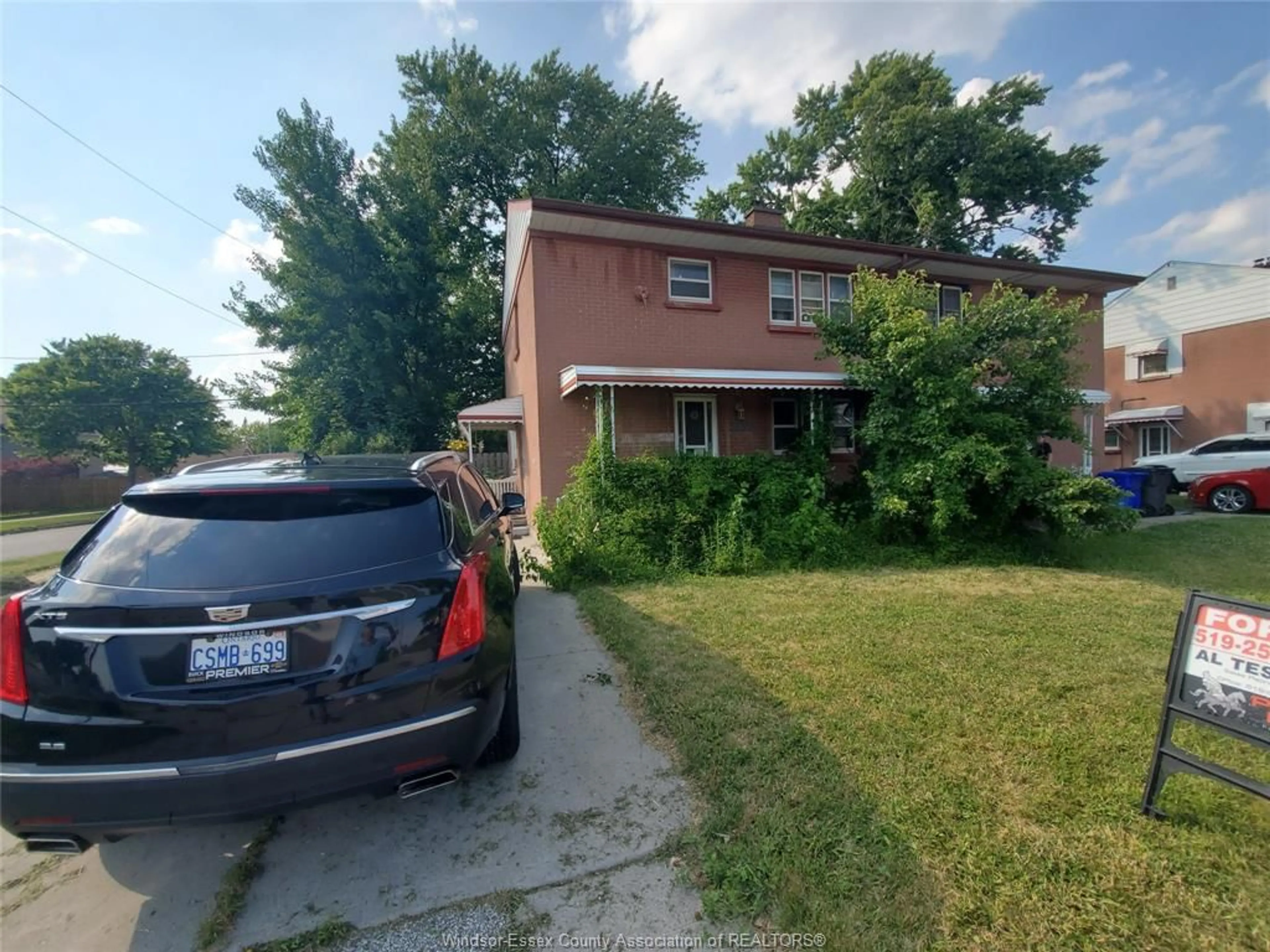 Frontside or backside of a home, the street view for 2182 TECUMSEH Rd, Windsor Ontario N9B 1V6