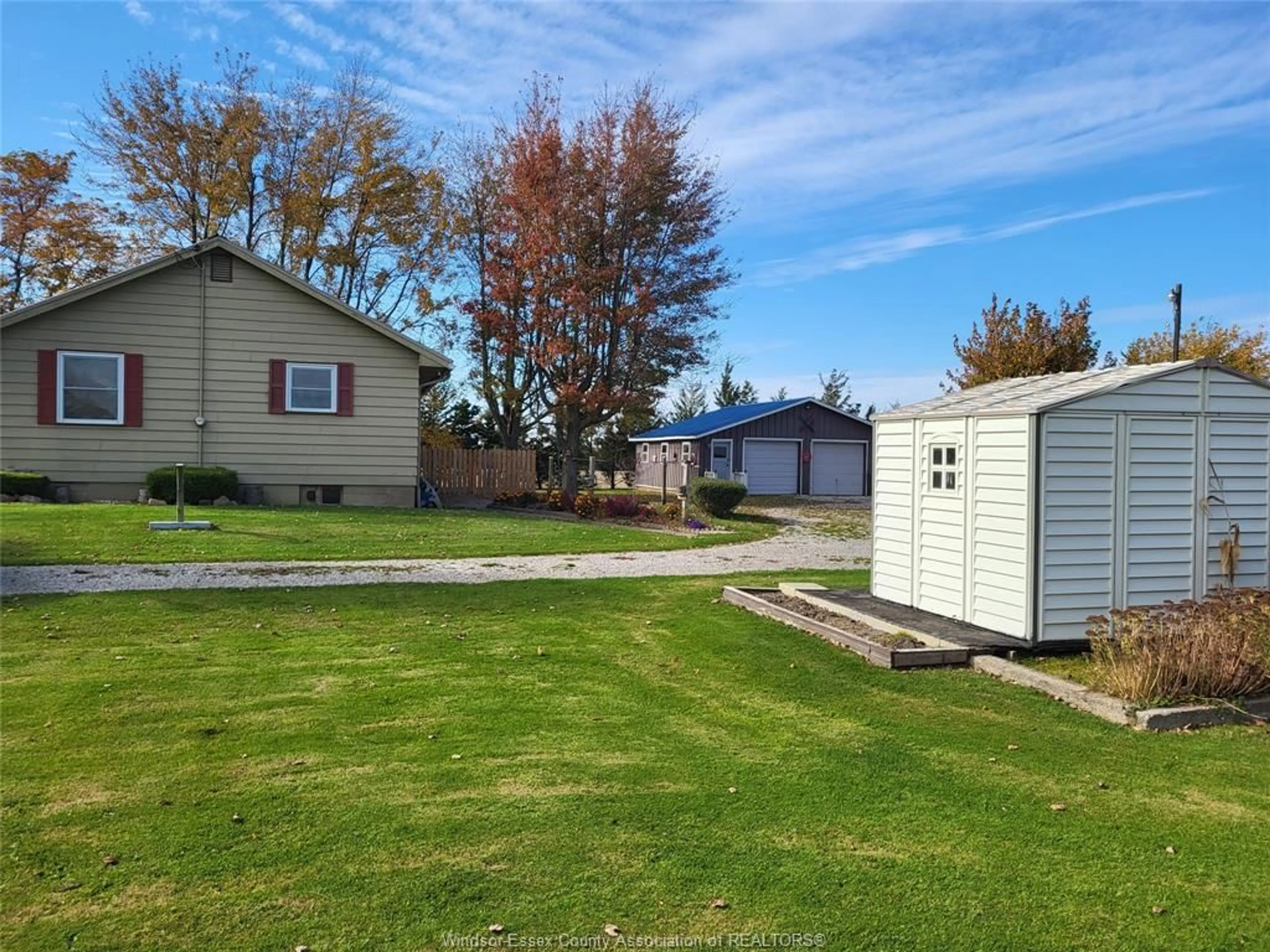 Frontside or backside of a home, the fenced backyard for 317 E ROAD 11, Kingsville Ontario N0R 1V0