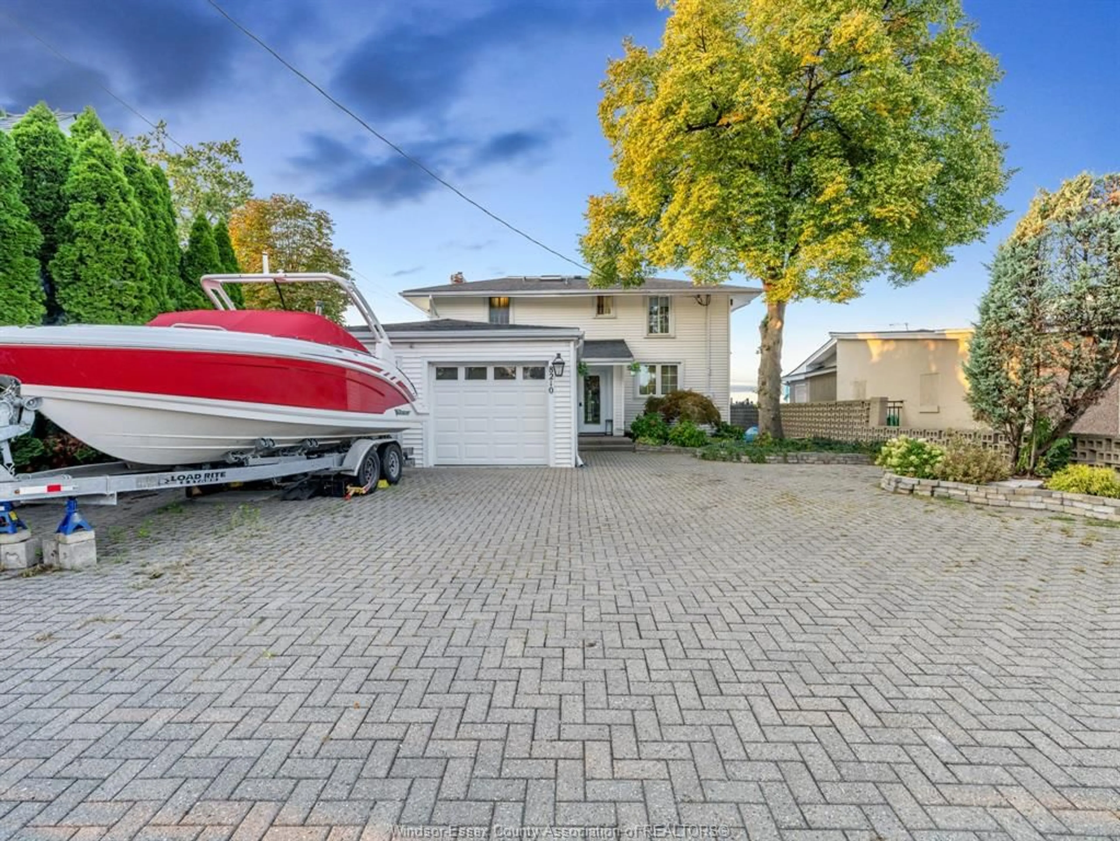 Frontside or backside of a home, the street view for 8210 RIVERSIDE Dr, Windsor Ontario N8S 1E6