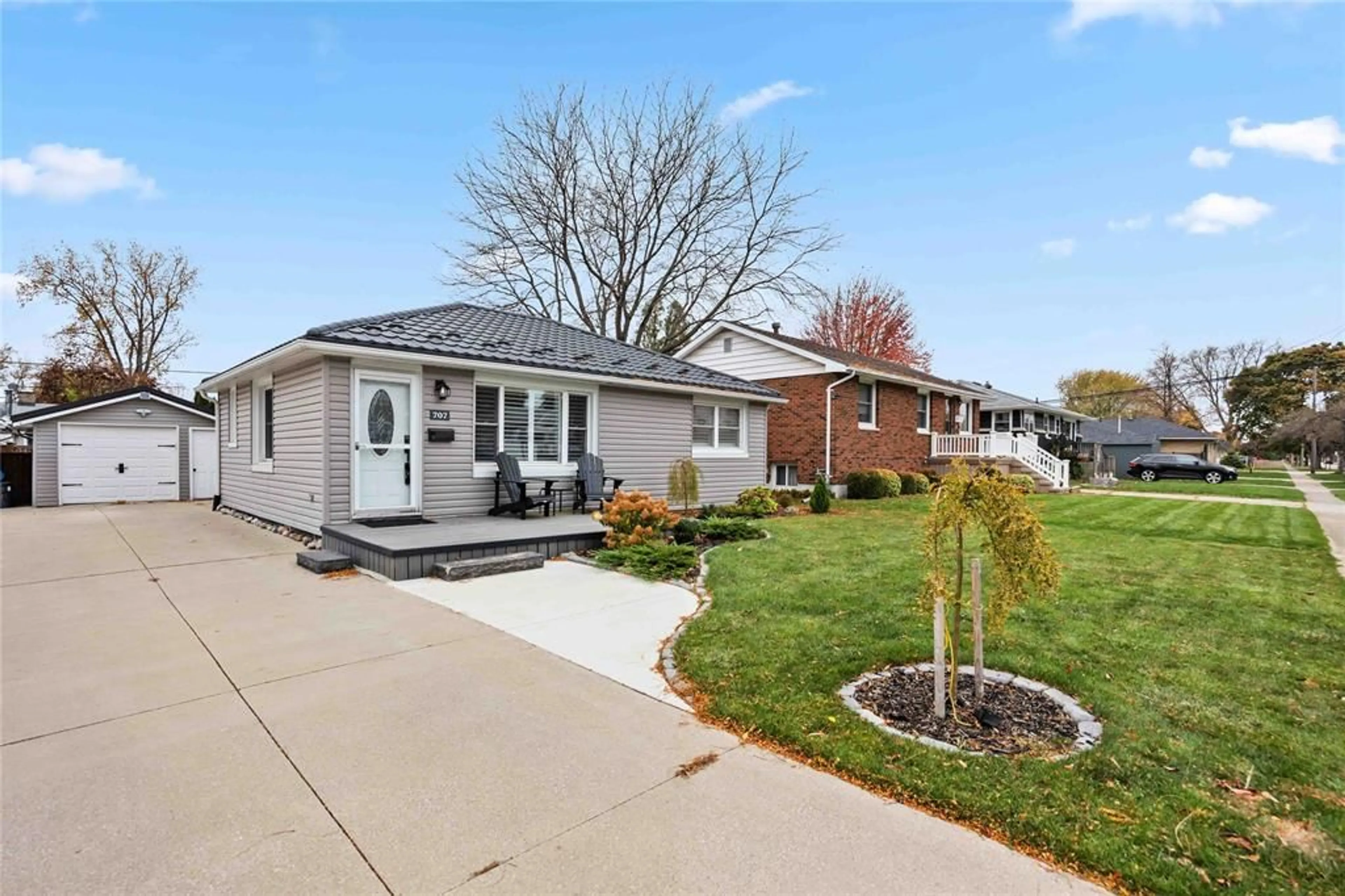 Frontside or backside of a home, cottage for 707 CHARLES St, Point Edward Ontario N7V 1C1