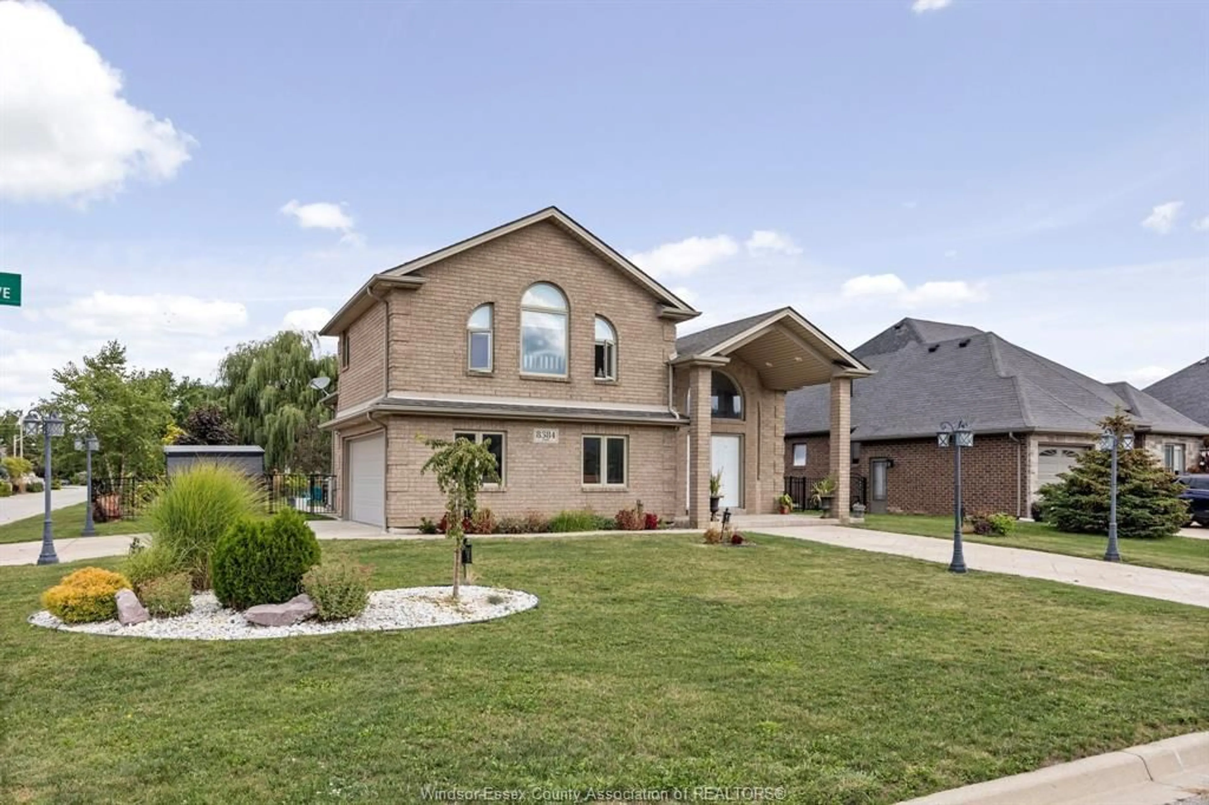 Frontside or backside of a home, the street view for 8384 ANNIE Ave, McGregor Ontario N0R 1J0