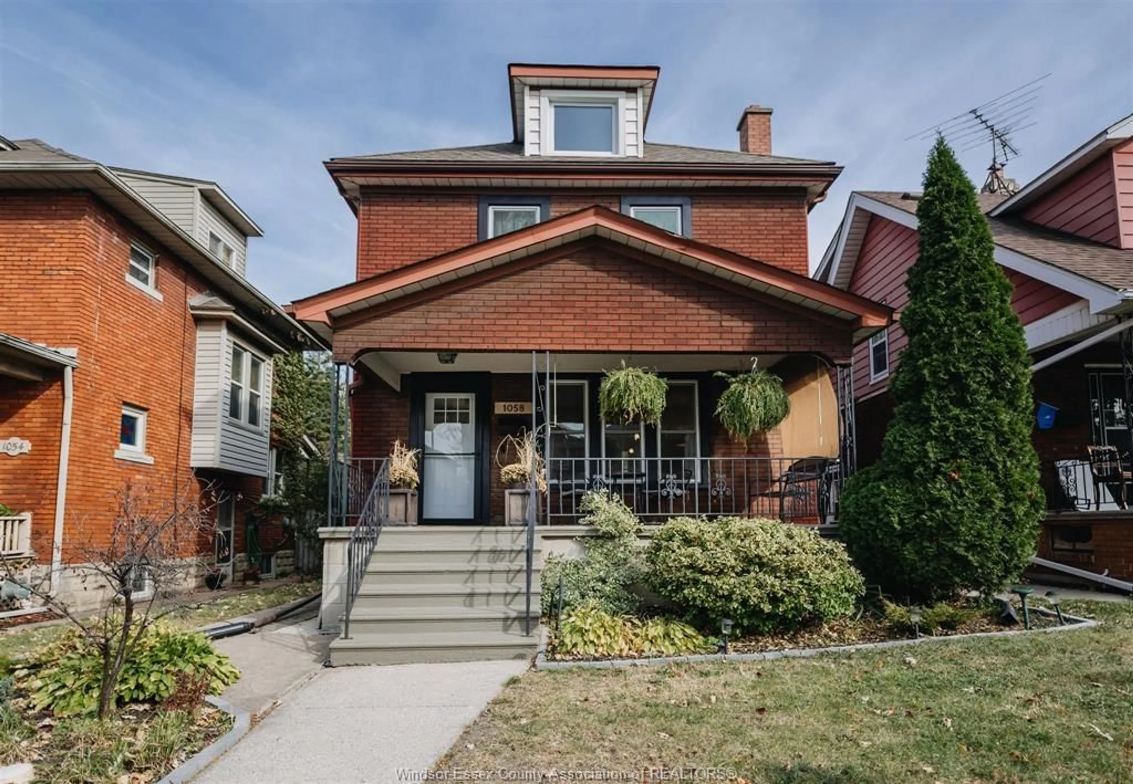 Frontside or backside of a home, the street view for 1058 DOUGALL Ave, Windsor Ontario N9A 4R6