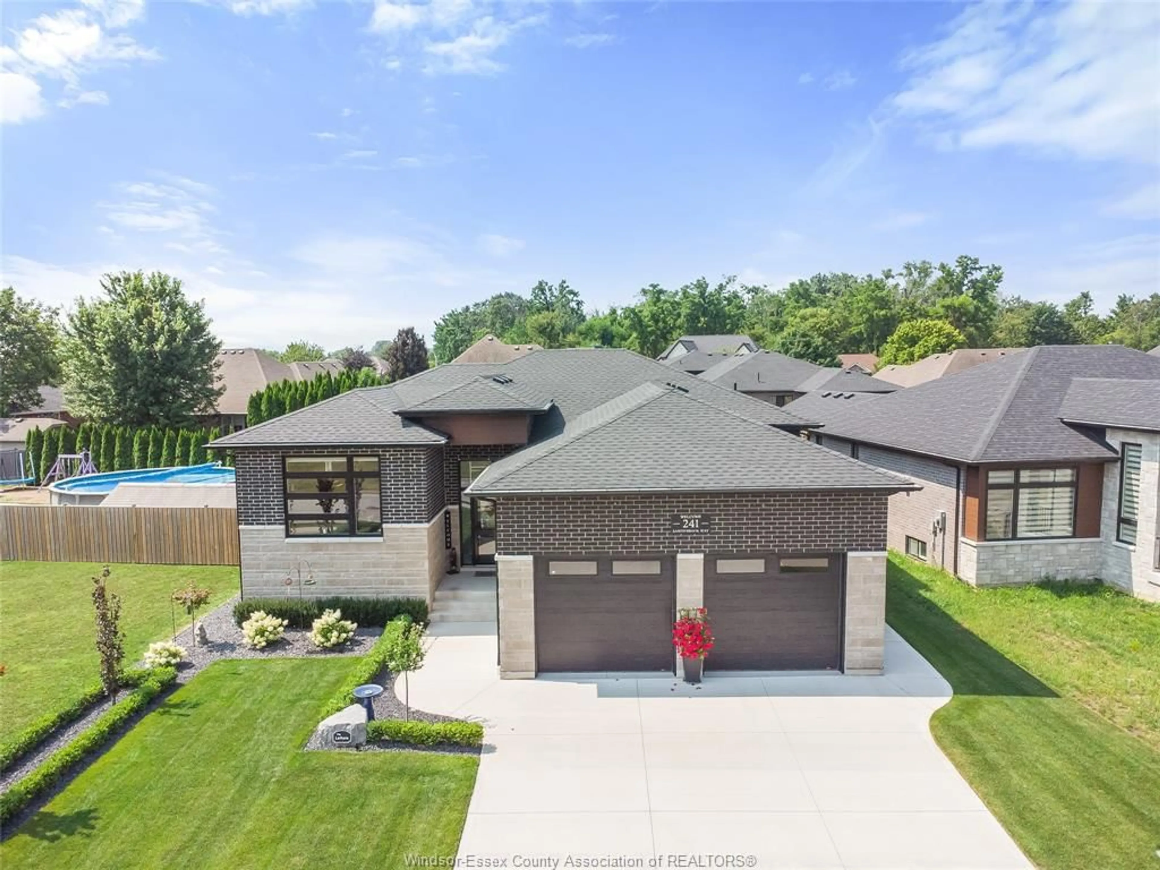 Frontside or backside of a home, the street view for 241 SANDYBROOK Way, Kingsville Ontario N9Y 0A3