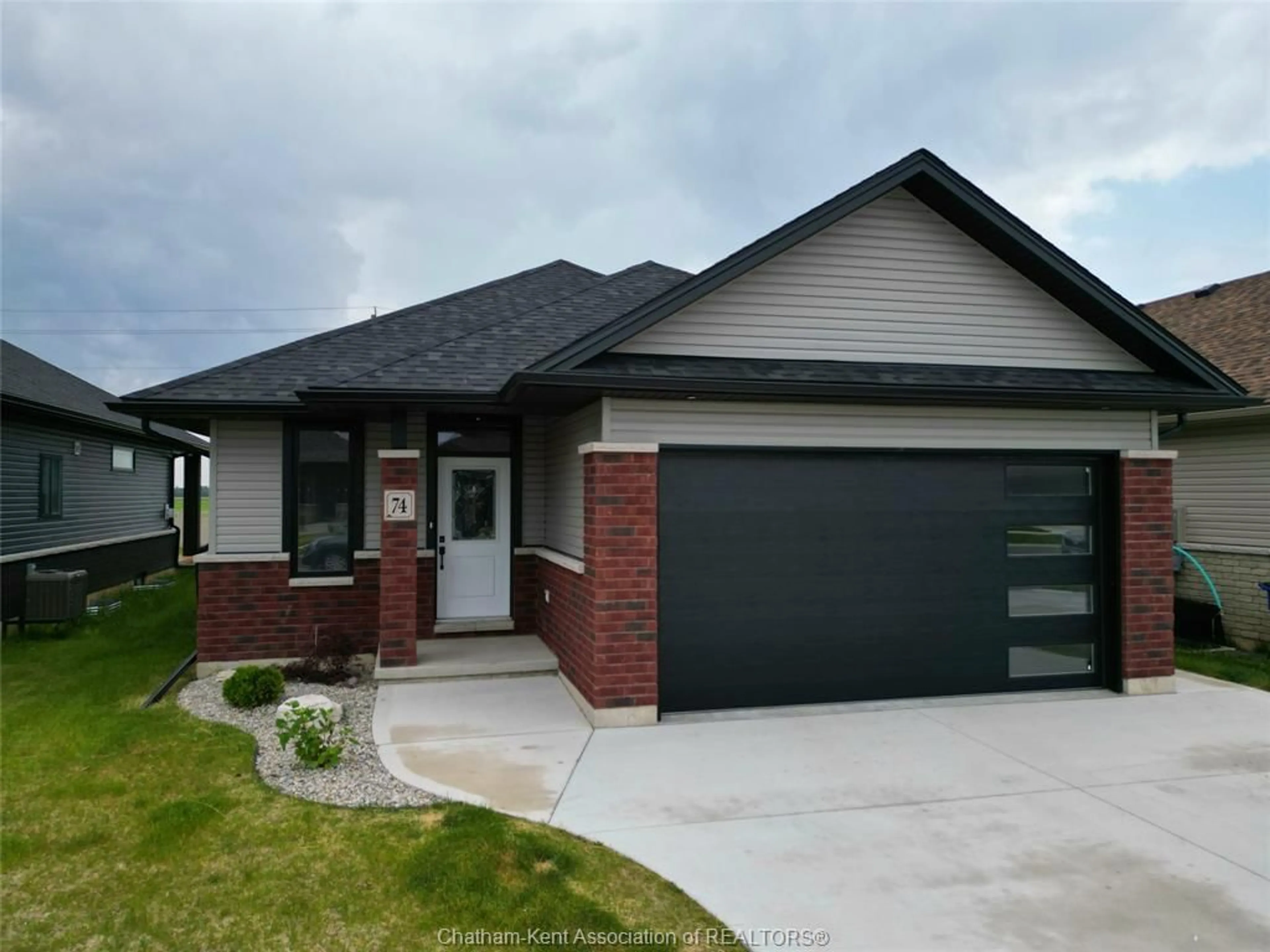 Home with brick exterior material for 74 EVENING Dr, Chatham Ontario N7L0B6