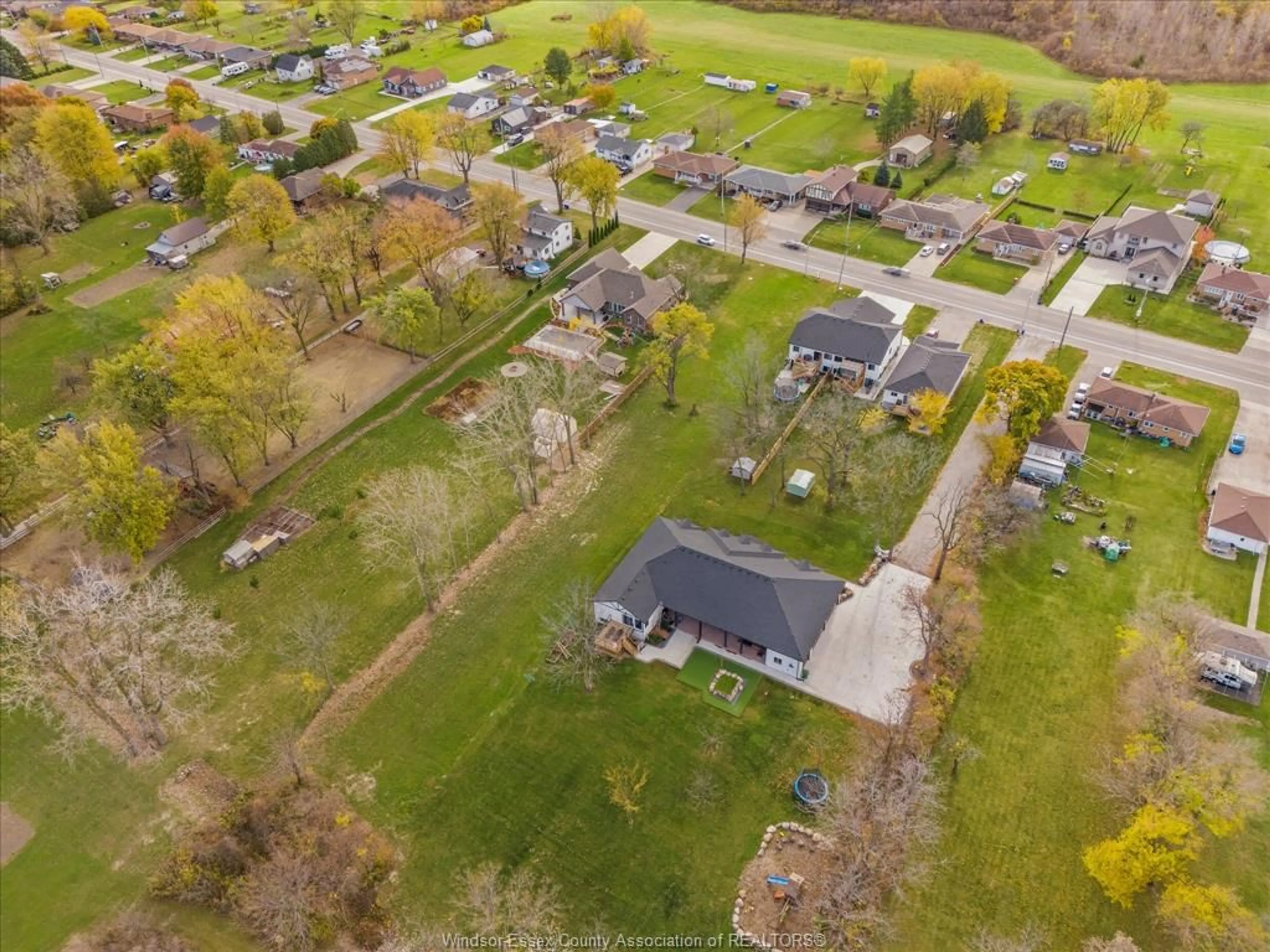 Frontside or backside of a home, the fenced backyard for 168/172 TEXAS Rd, Amherstburg Ontario N9V 2R7