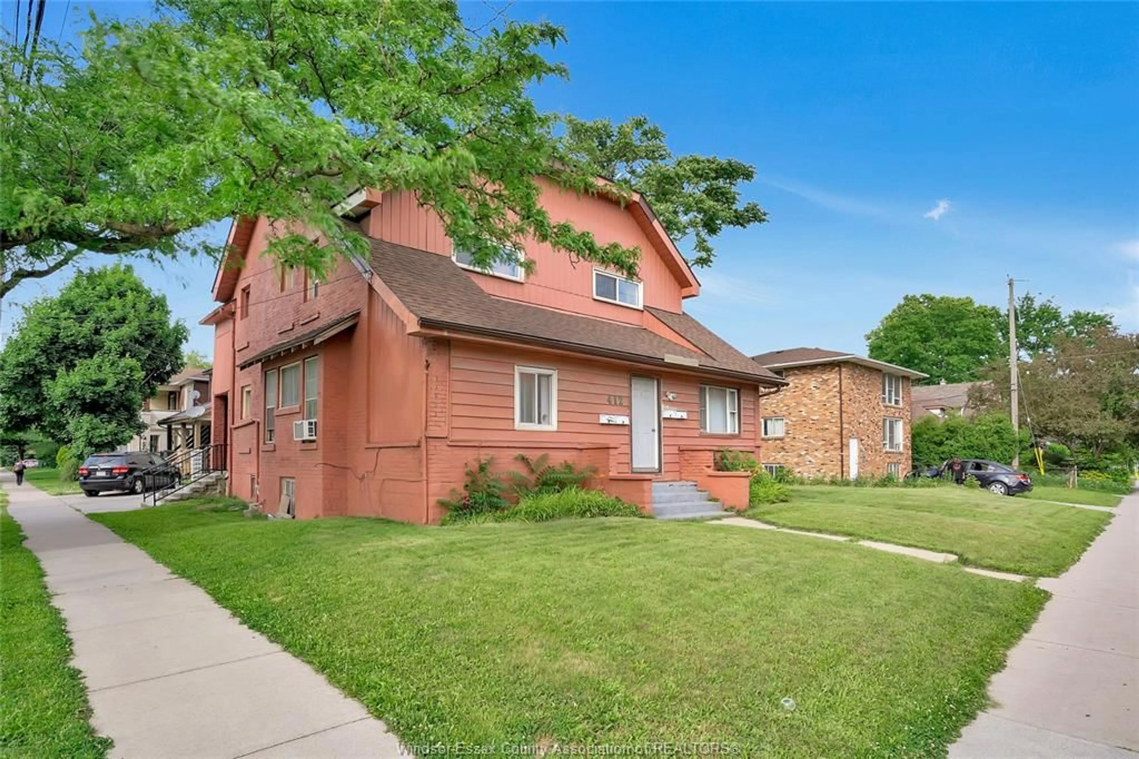 Frontside or backside of a home, the fenced backyard for 412 PRINCE Rd, Windsor Ontario N9C 2Y8