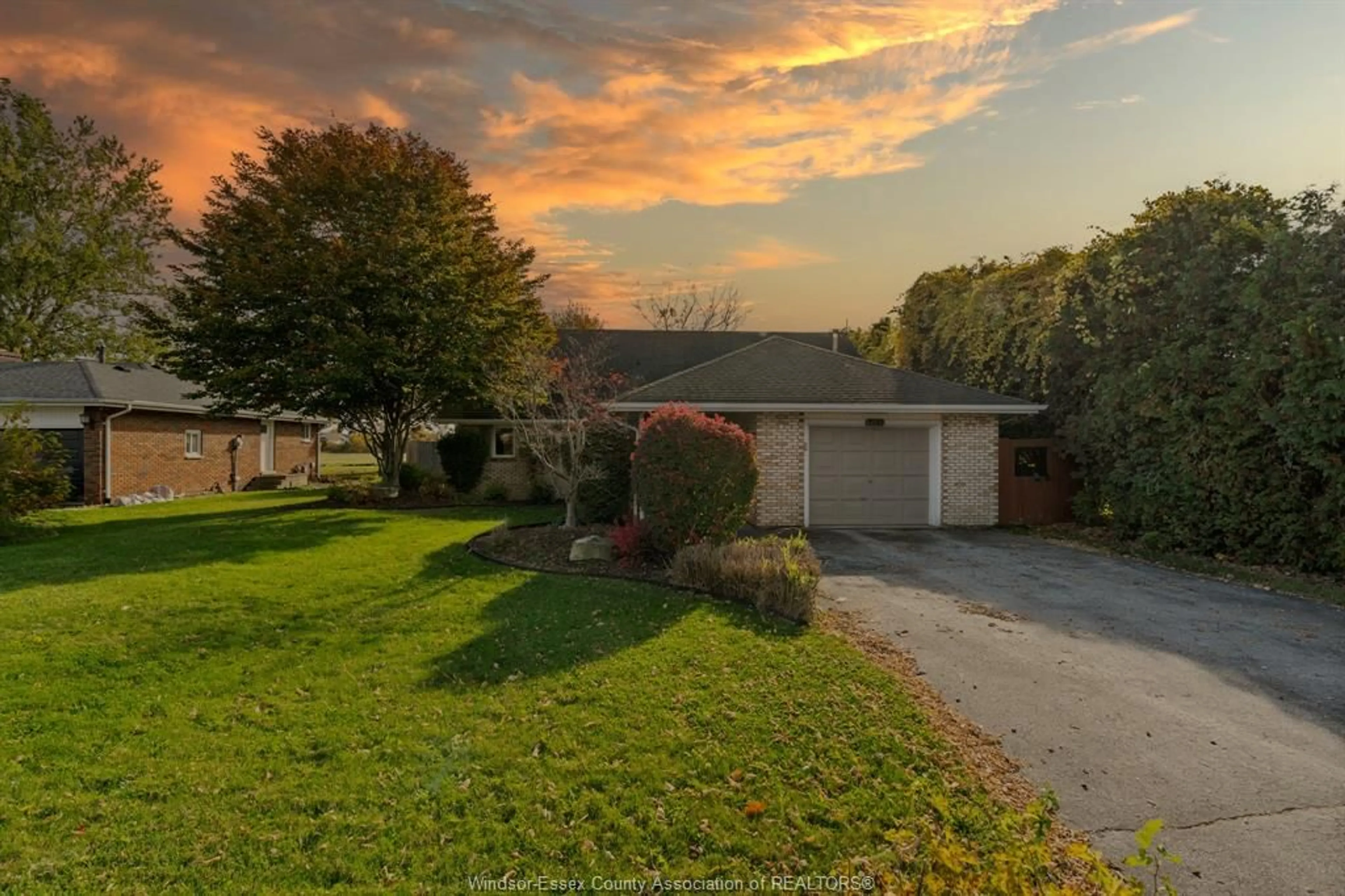 Frontside or backside of a home, the fenced backyard for 1541 County Rd 22, Lakeshore Ontario N0R 1A0