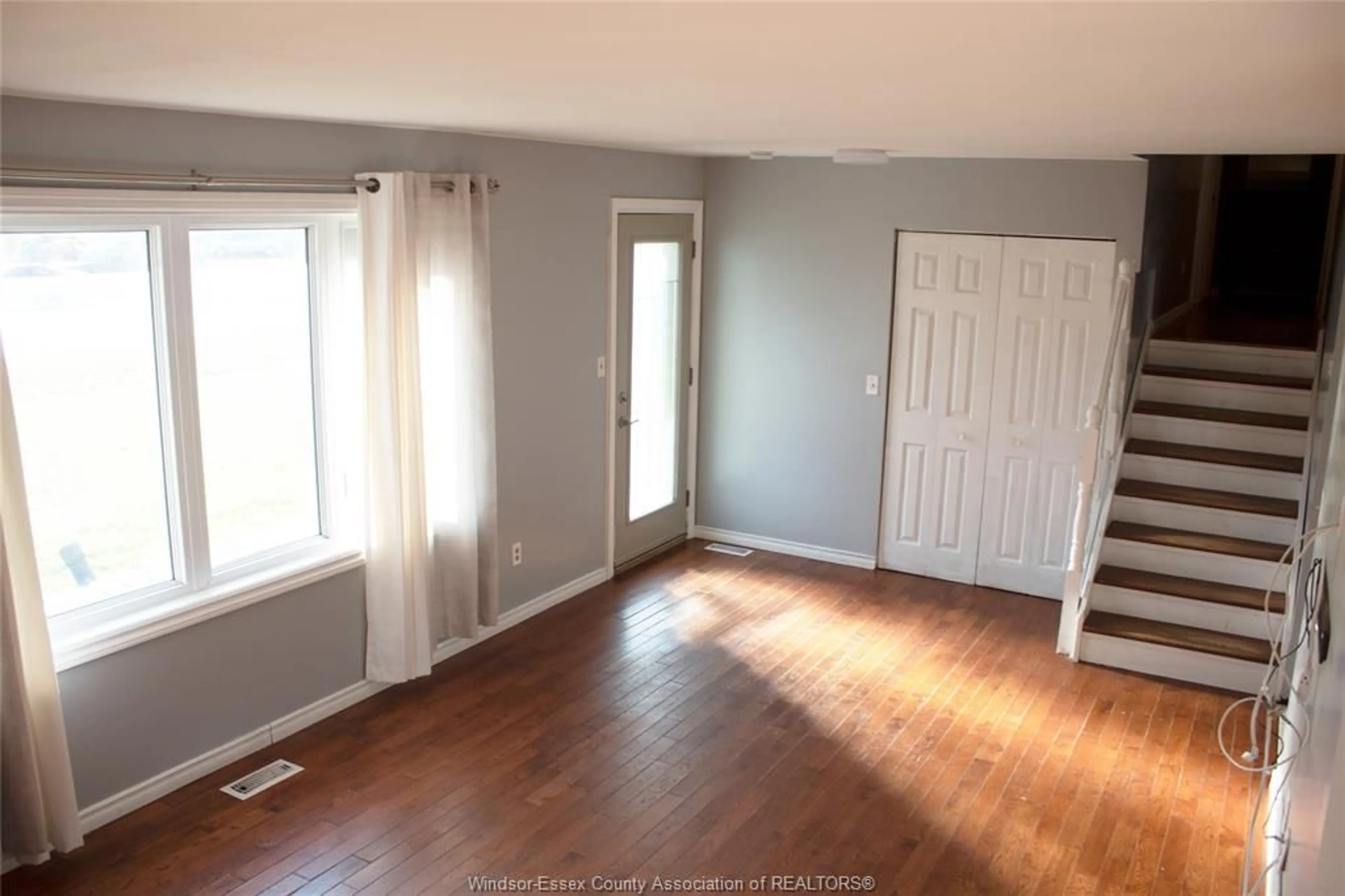 A pic of a room, wood floors for 380 HIGHWAY 18, LaSalle Ontario N9J 1Z7