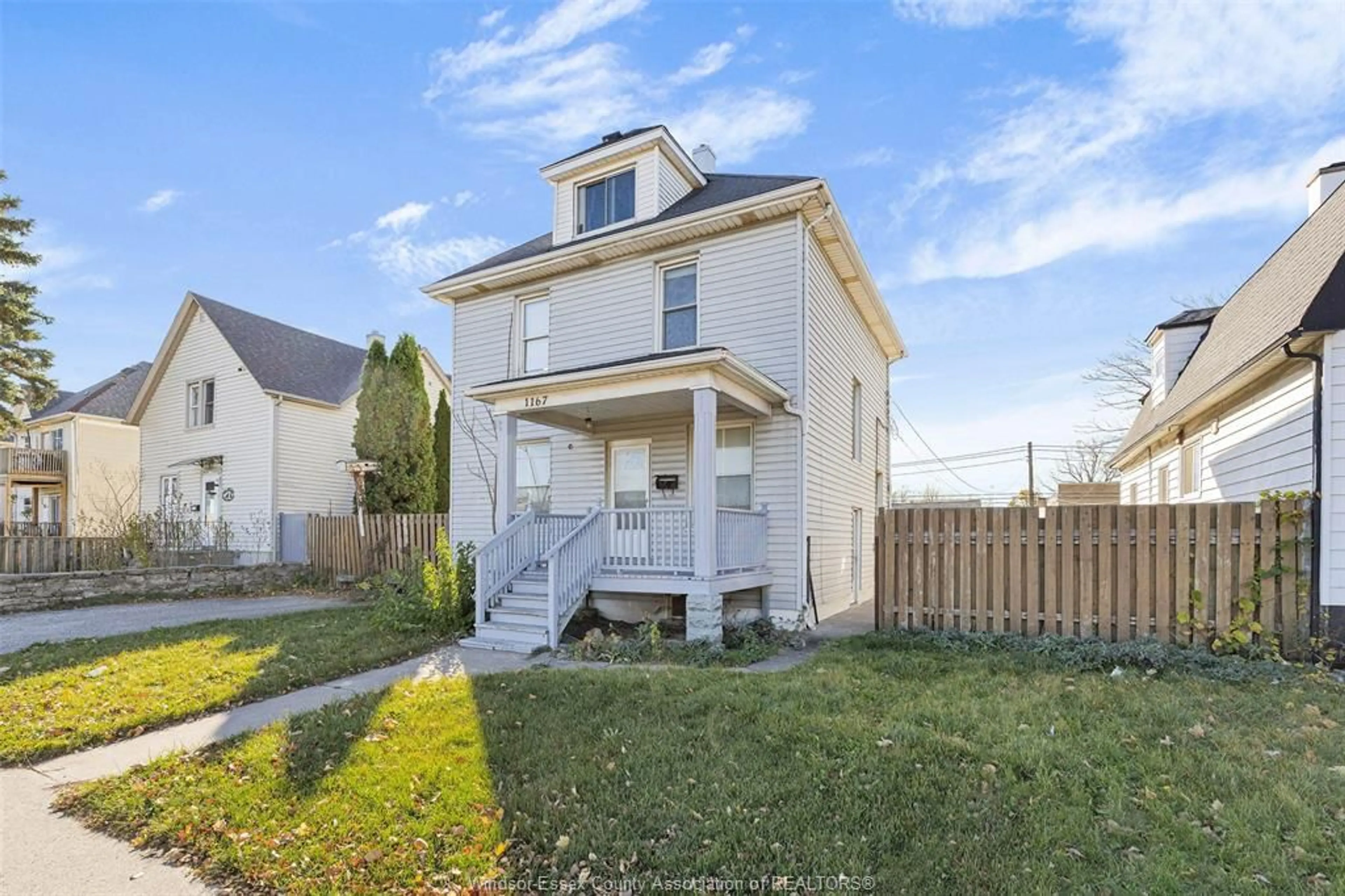 A pic from exterior of the house or condo, the fenced backyard for 1167 WALKER Rd, Windsor Ontario N8Y 2N8