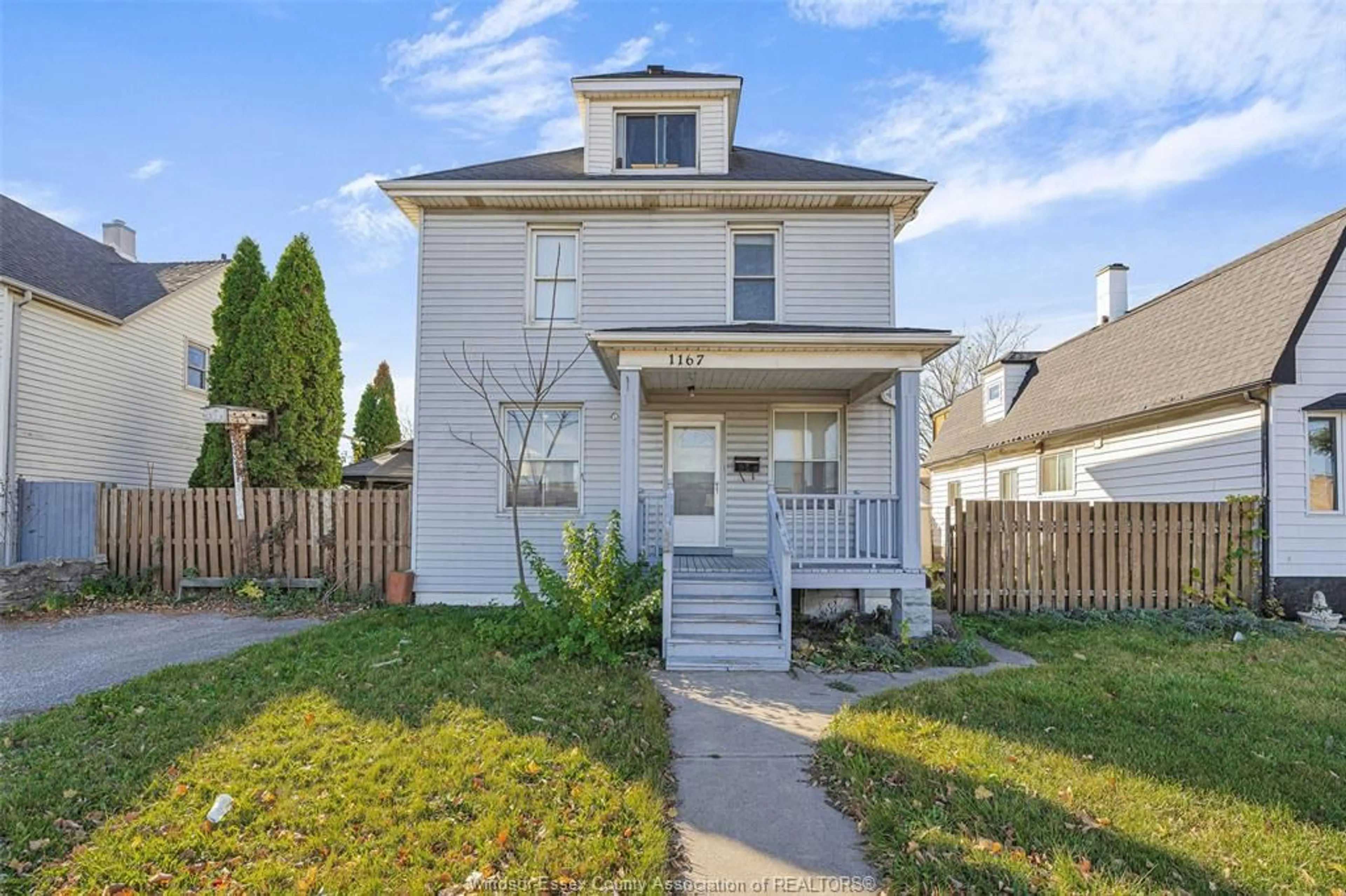 A pic from exterior of the house or condo, the fenced backyard for 1167 WALKER Rd, Windsor Ontario N8Y 2N8