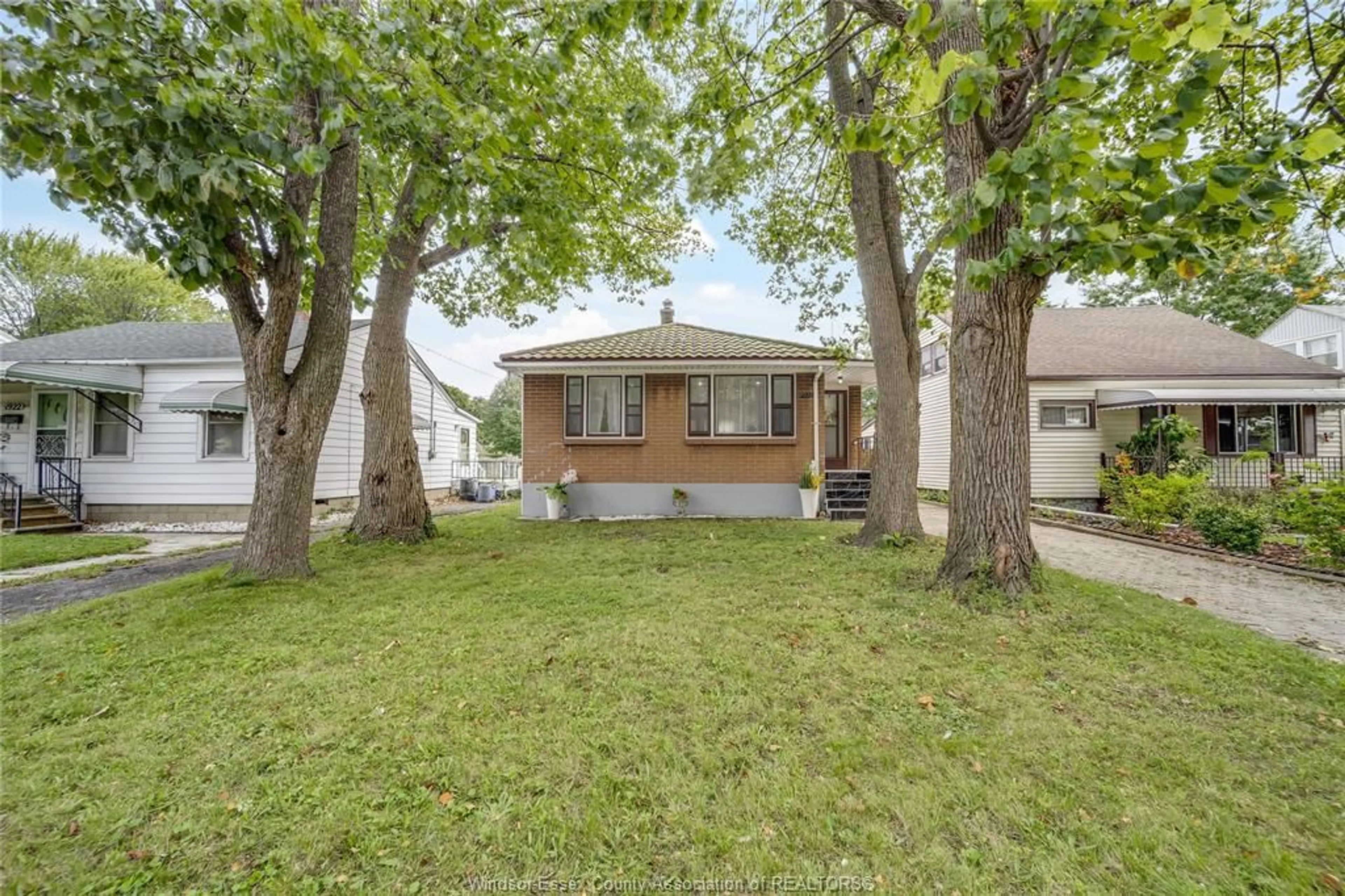 Frontside or backside of a home, the fenced backyard for 1928 CENTRAL, Windsor Ontario N8W 4H9