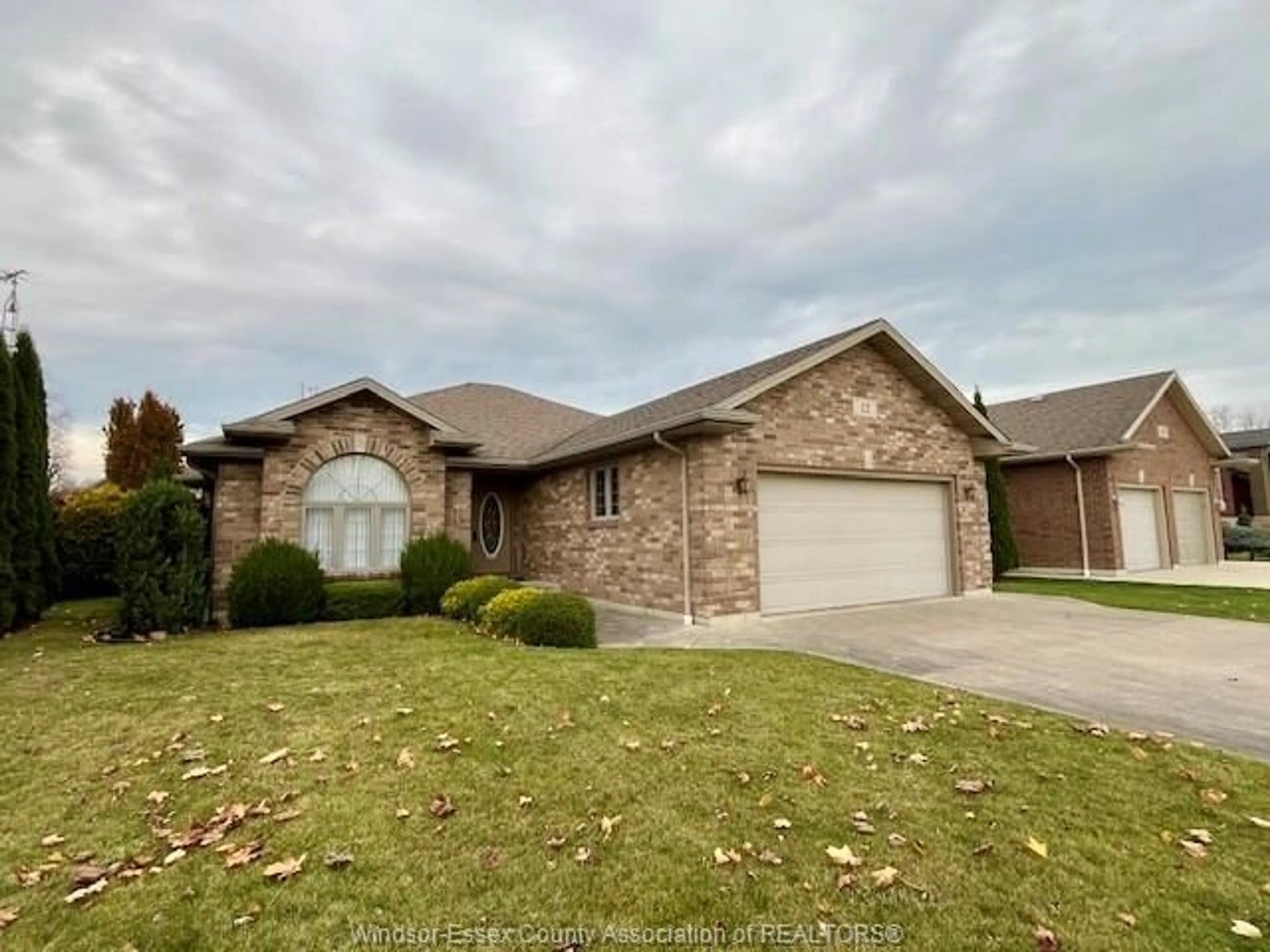 Frontside or backside of a home, the street view for 12 Pecanwood Dr, Kingsville Ontario N9Y 4G3