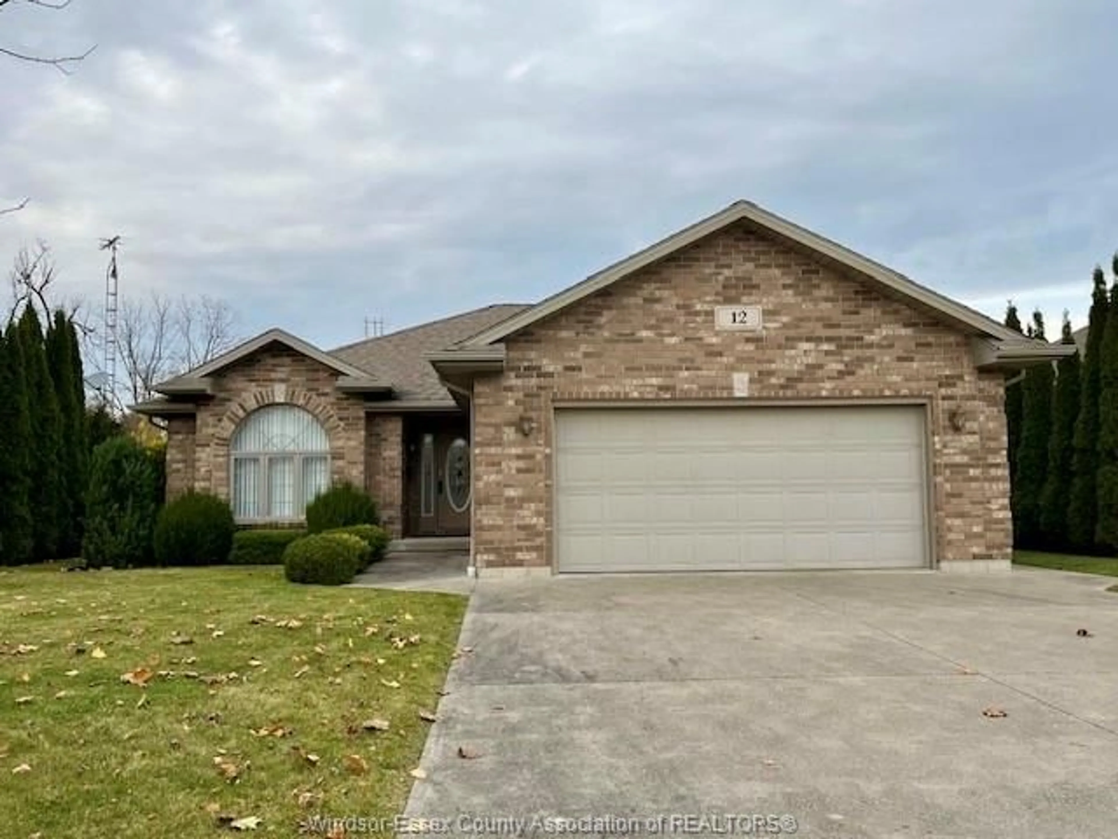 Frontside or backside of a home, the street view for 12 Pecanwood Dr, Kingsville Ontario N9Y 4G3