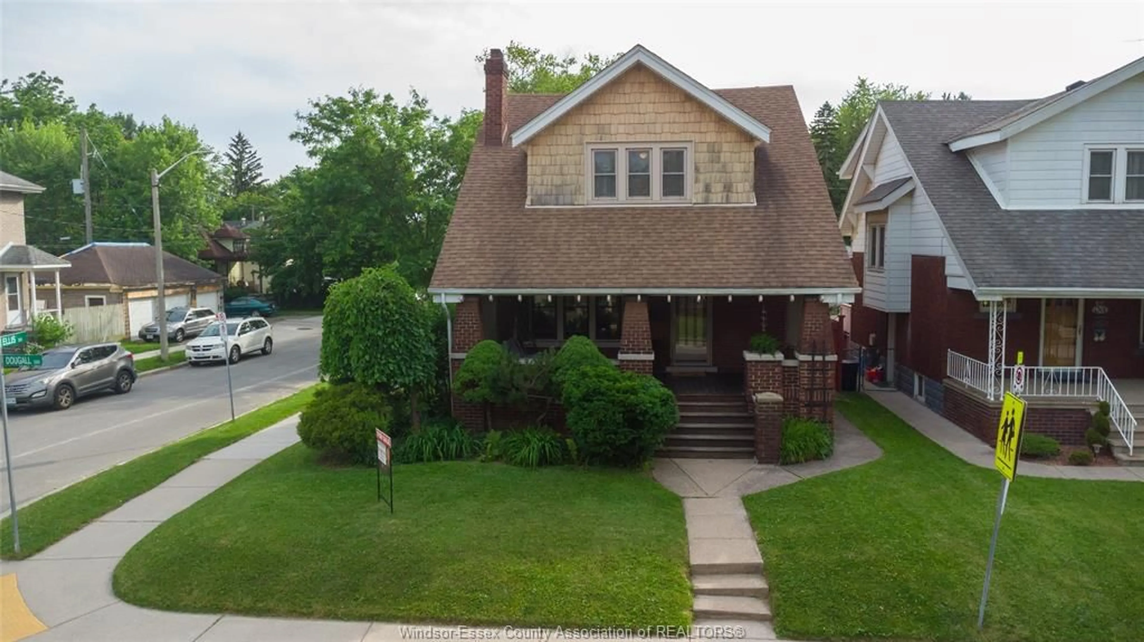 Frontside or backside of a home, the street view for 1395 DOUGALL Ave, Windsor Ontario N8X 1R6