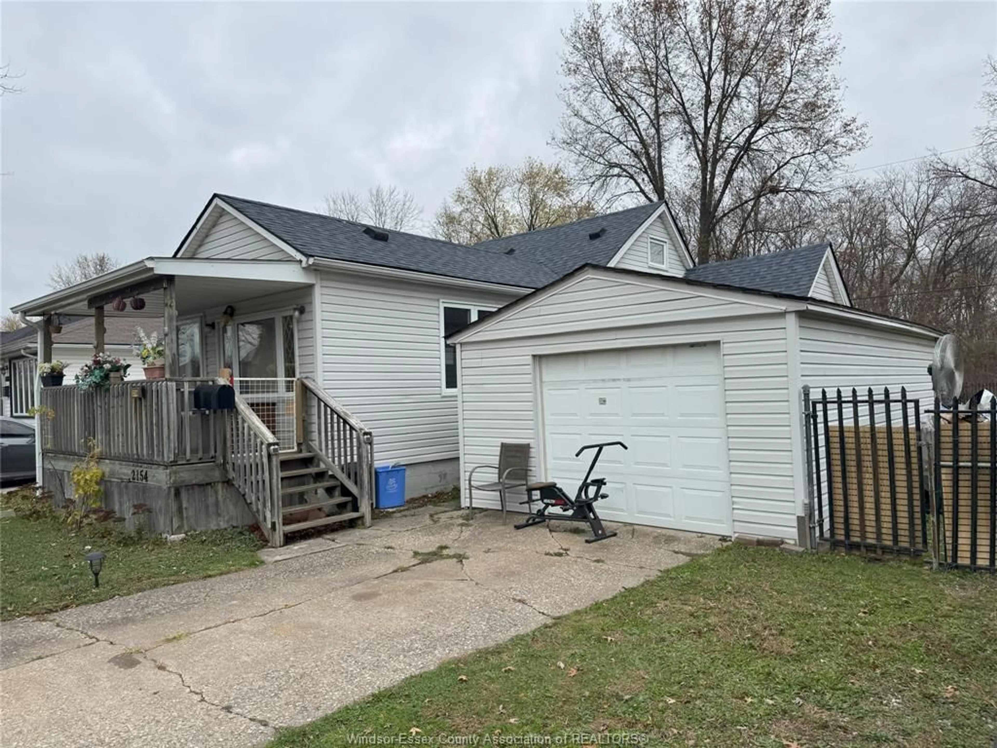 Frontside or backside of a home, the fenced backyard for 2154 LONGFELLOW Ave, Windsor Ontario N9B 3J6