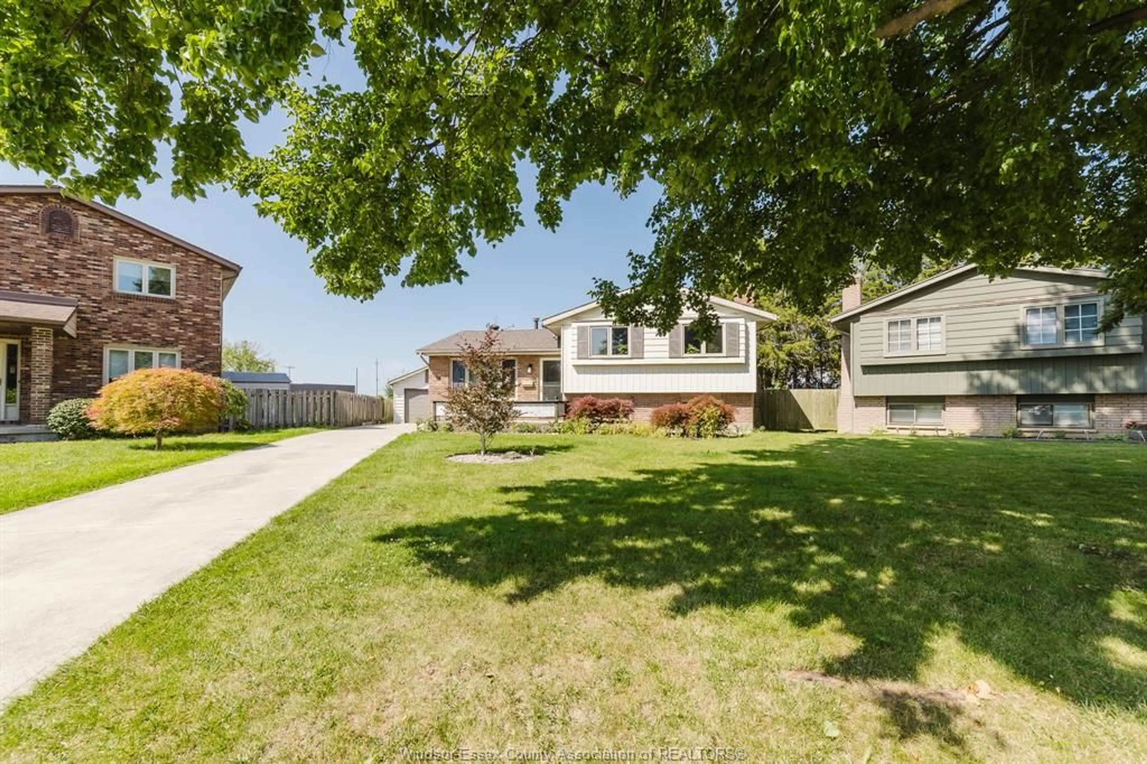 Frontside or backside of a home, the fenced backyard for 68 ARGYLE Cres, Chatham Ontario N7L 4T8