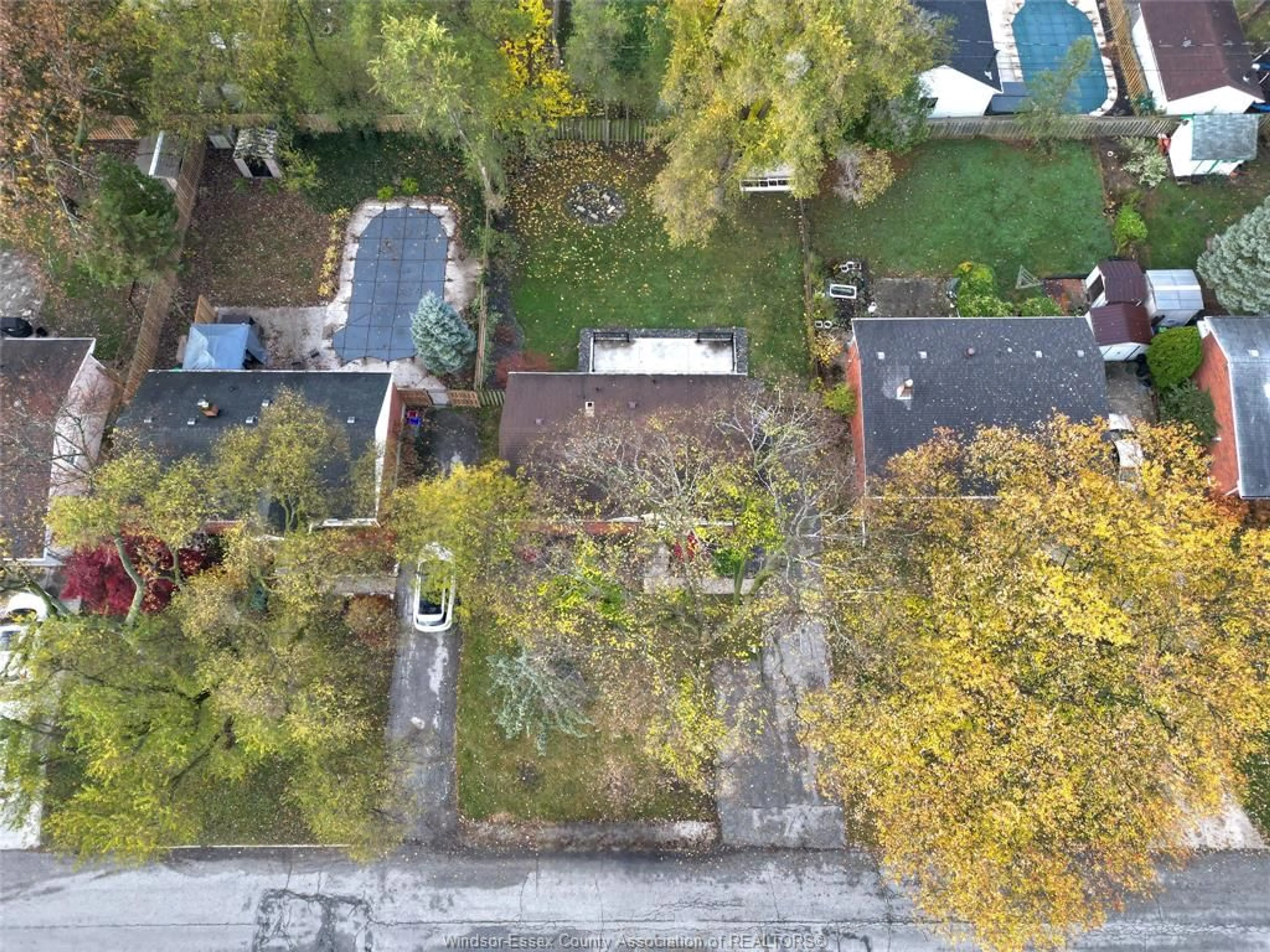 Frontside or backside of a home, the fenced backyard for 3145 VIRGINIA PARK Ave, Windsor Ontario N9E 2C1