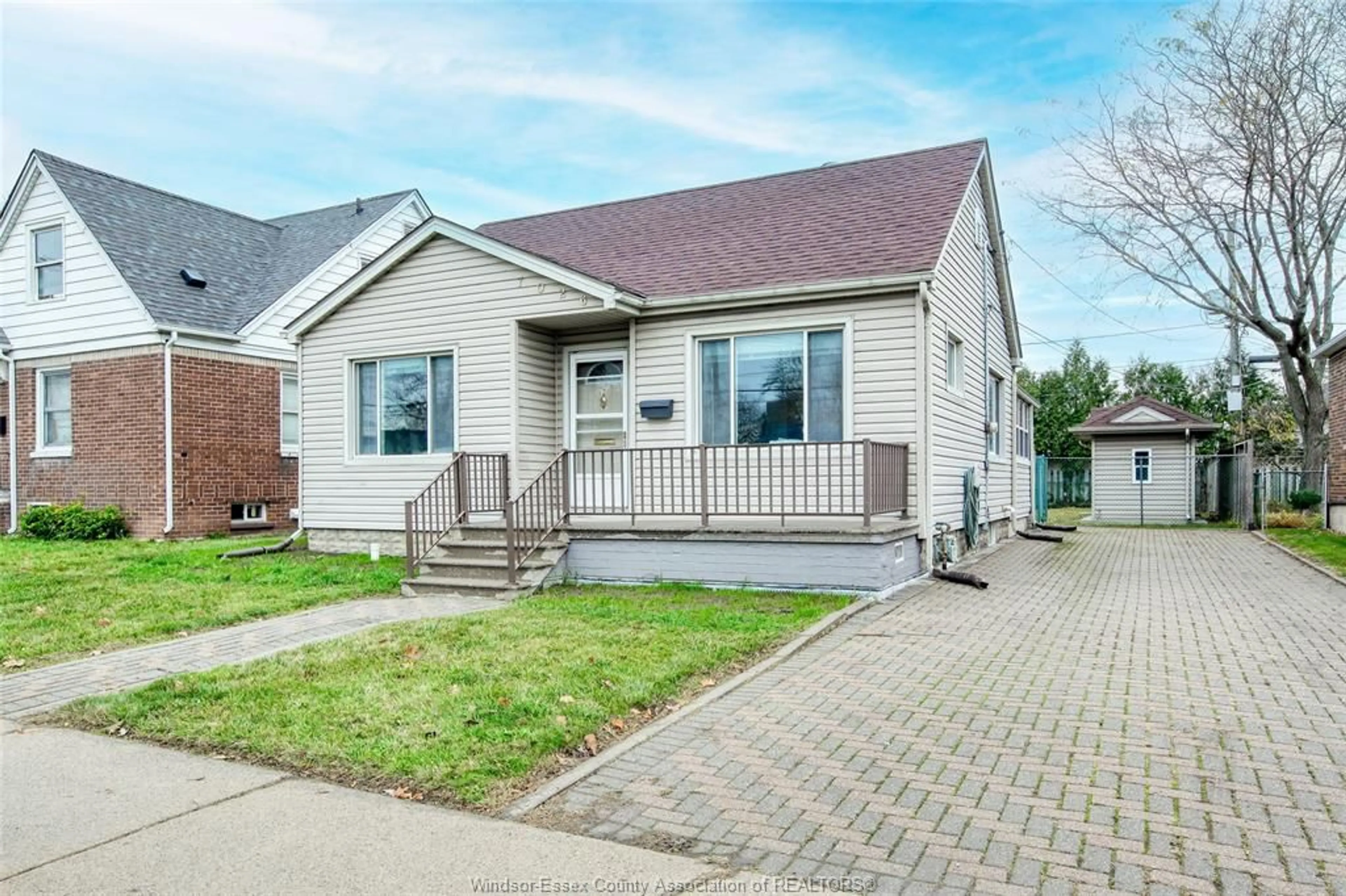 Frontside or backside of a home, cottage for 7026 WYANDOTTE St, Windsor Ontario N8S 1P9