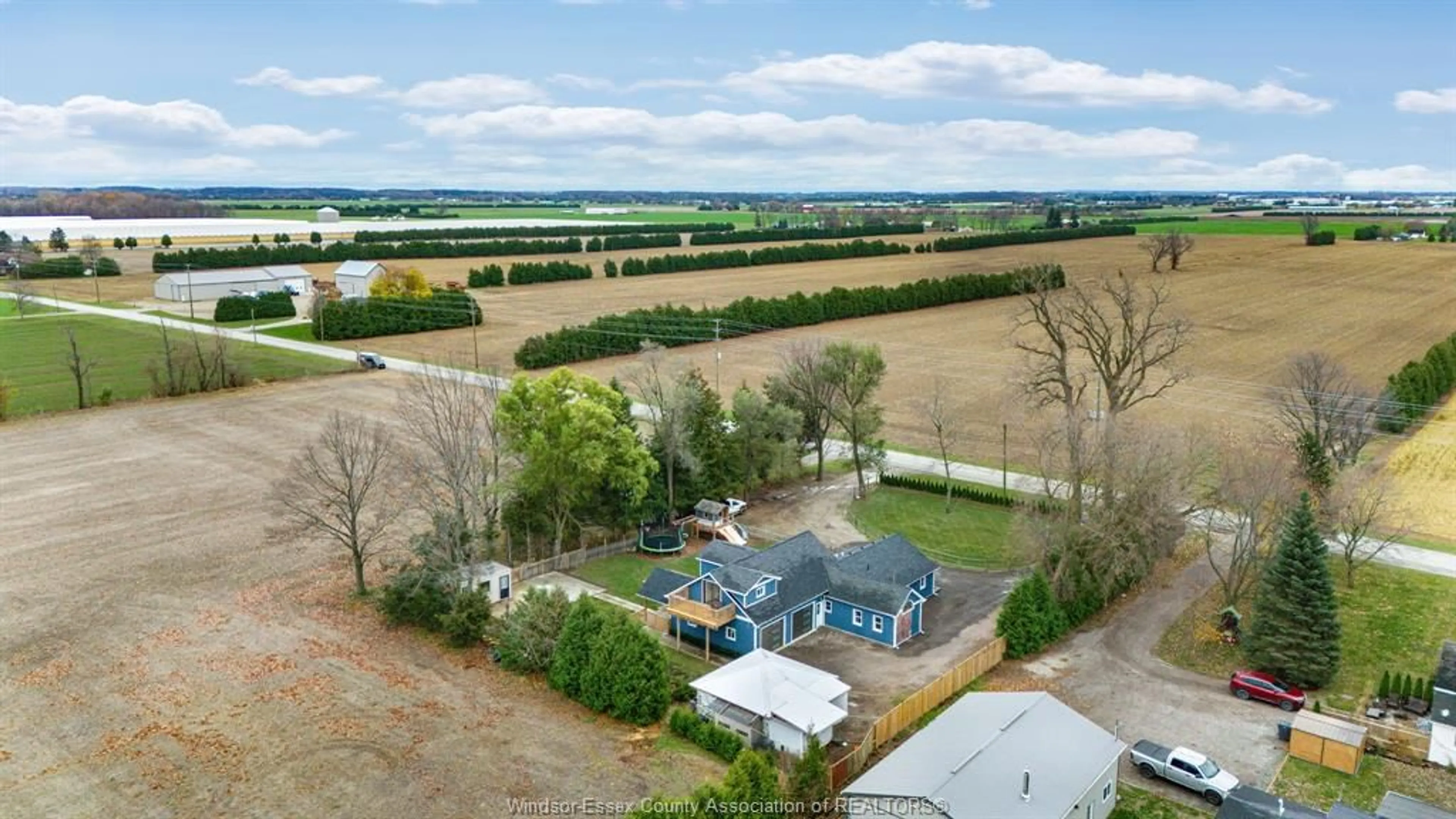 A pic from exterior of the house or condo, the fenced backyard for 913 MERSEA ROAD 5, Leamington Ontario N8H 3V6