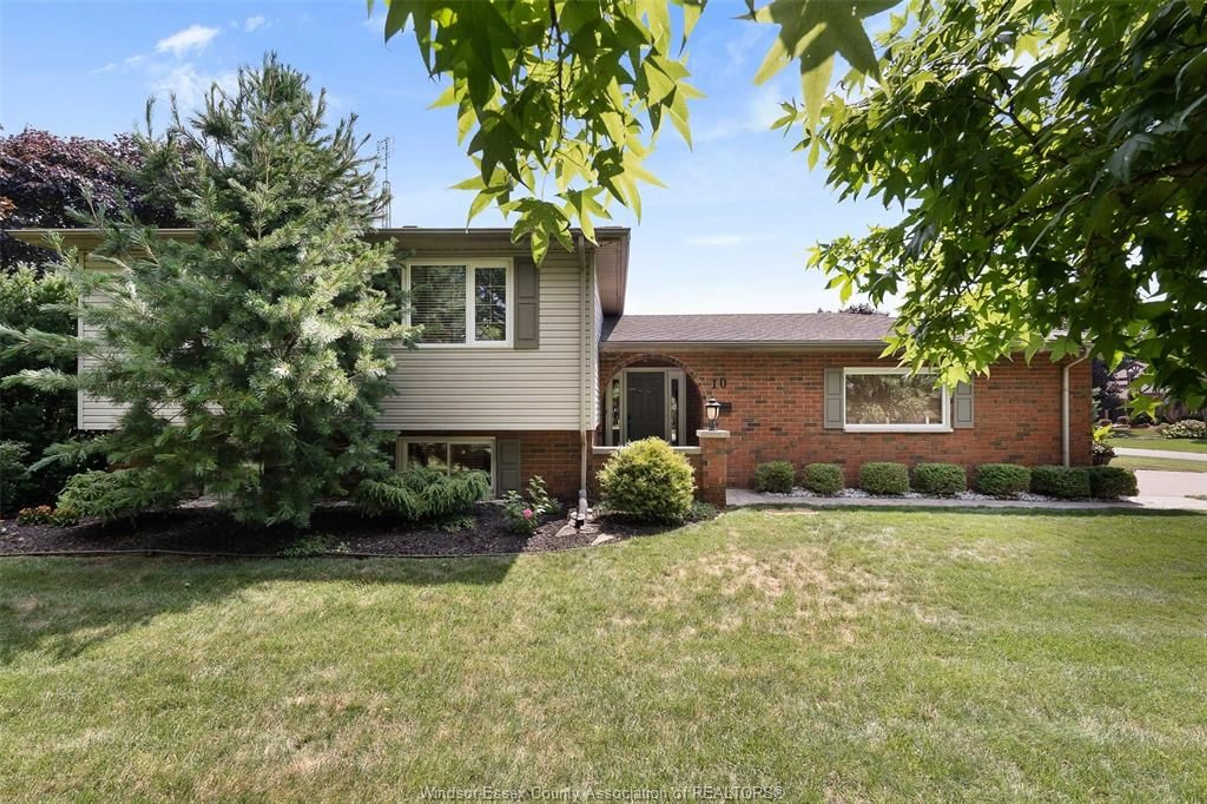 Home with brick exterior material for 10 KENNETH Dr, Leamington Ontario N8H 4B3