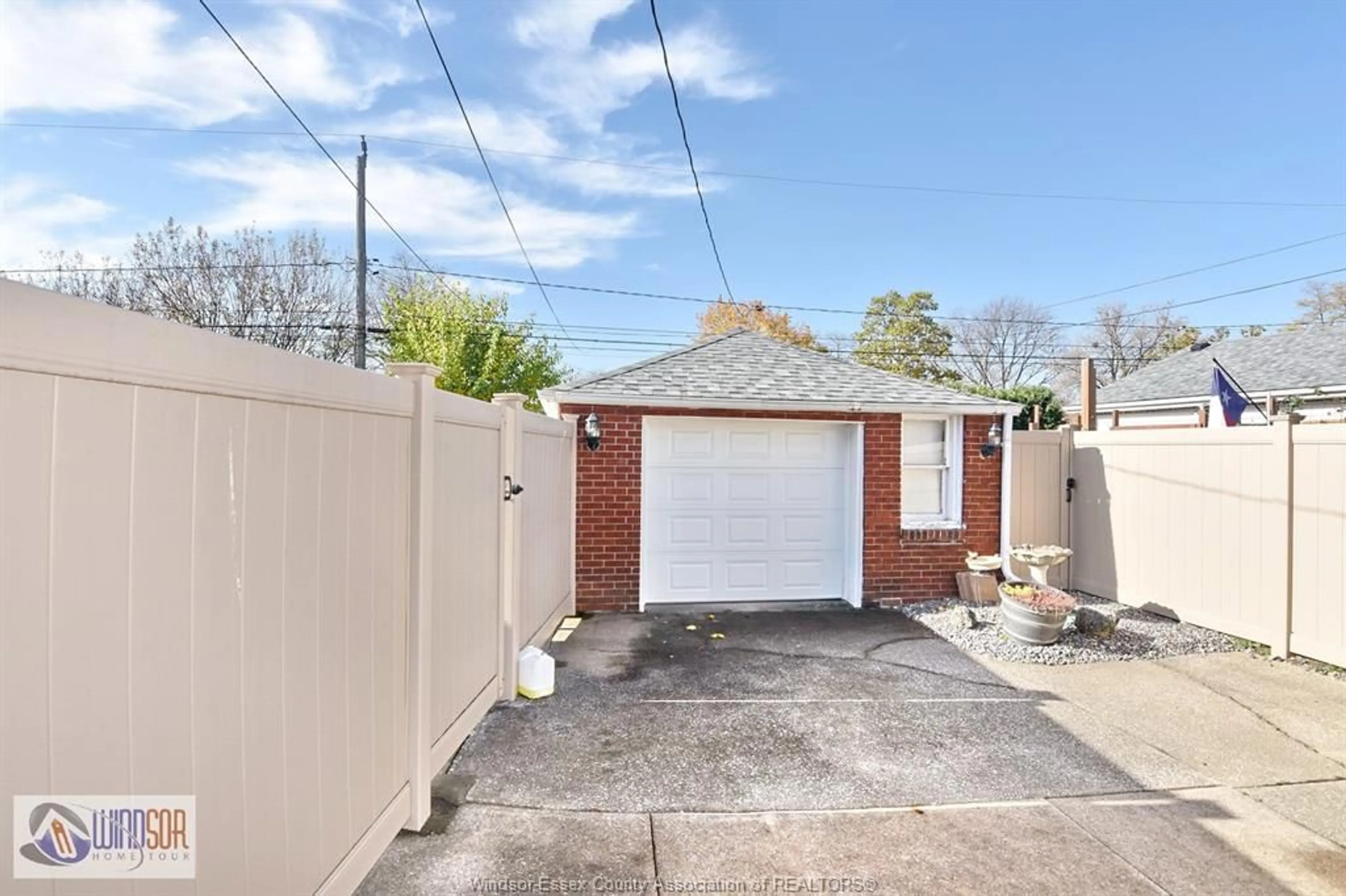 Frontside or backside of a home, the fenced backyard for 2245 PARKWOOD, Windsor Ontario N8W 2K1