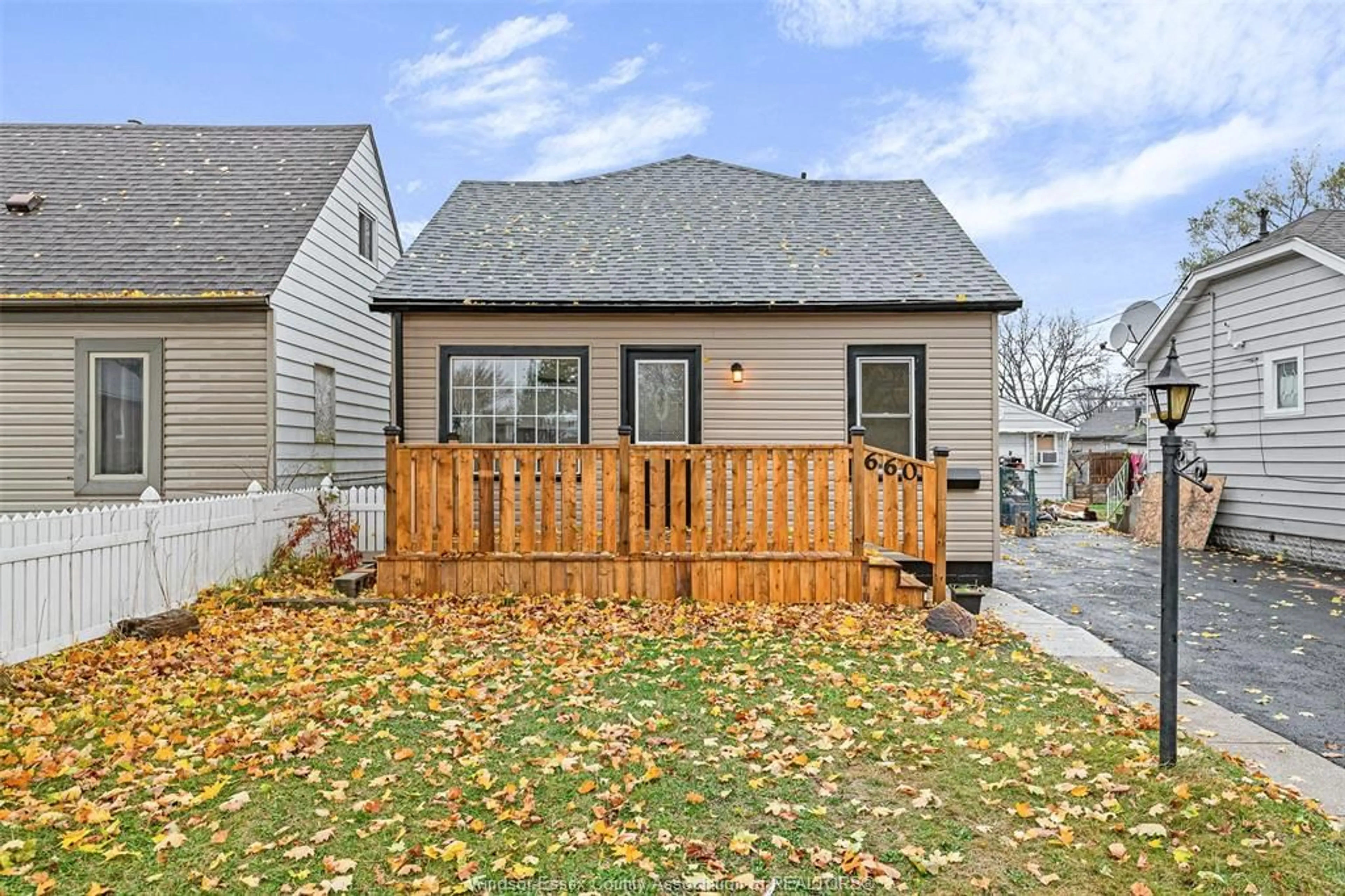 Frontside or backside of a home, the fenced backyard for 660 CHARLOTTE, Windsor Ontario N8X 3A5