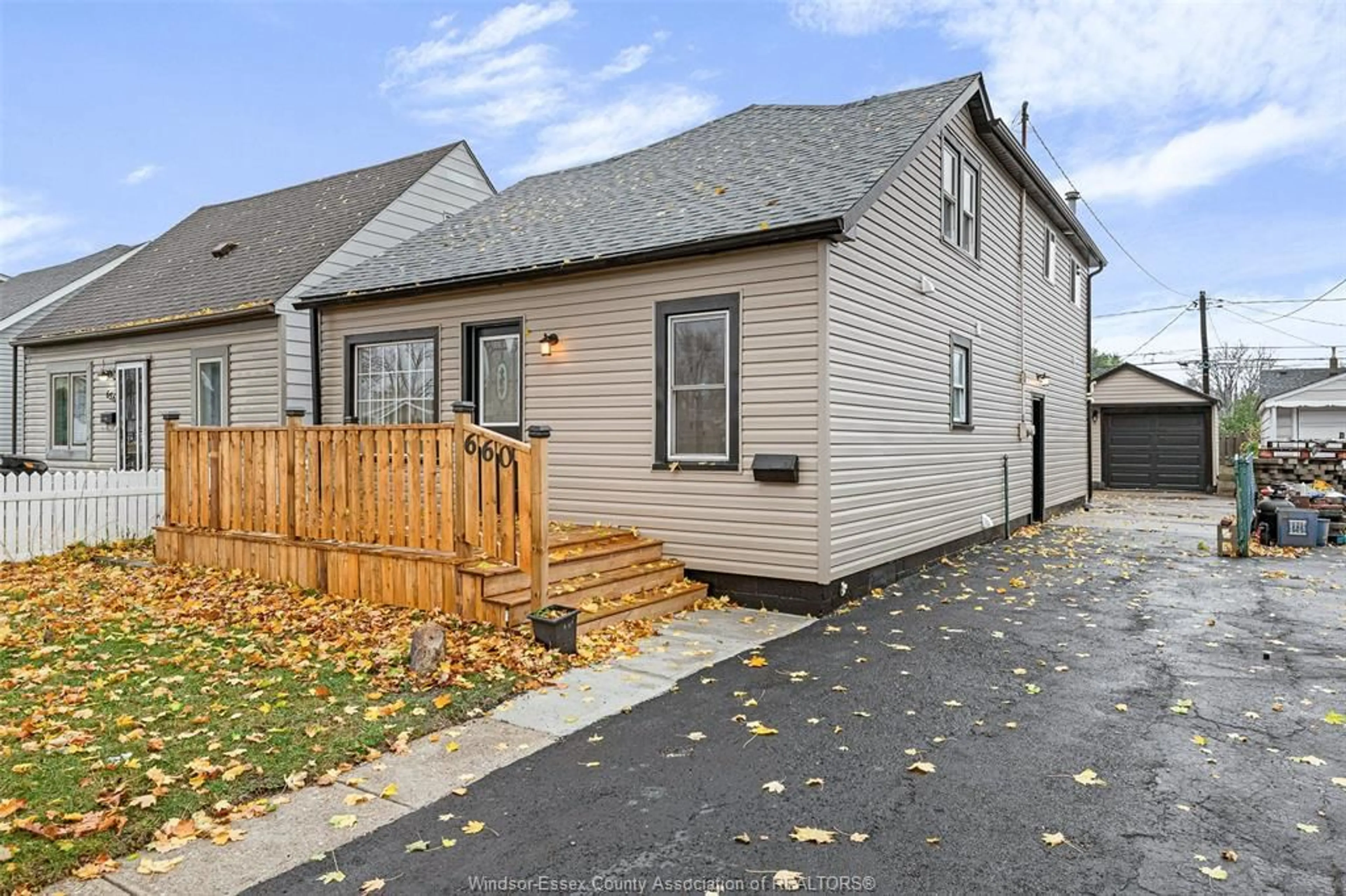 A pic from exterior of the house or condo, the fenced backyard for 660 CHARLOTTE, Windsor Ontario N8X 3A5