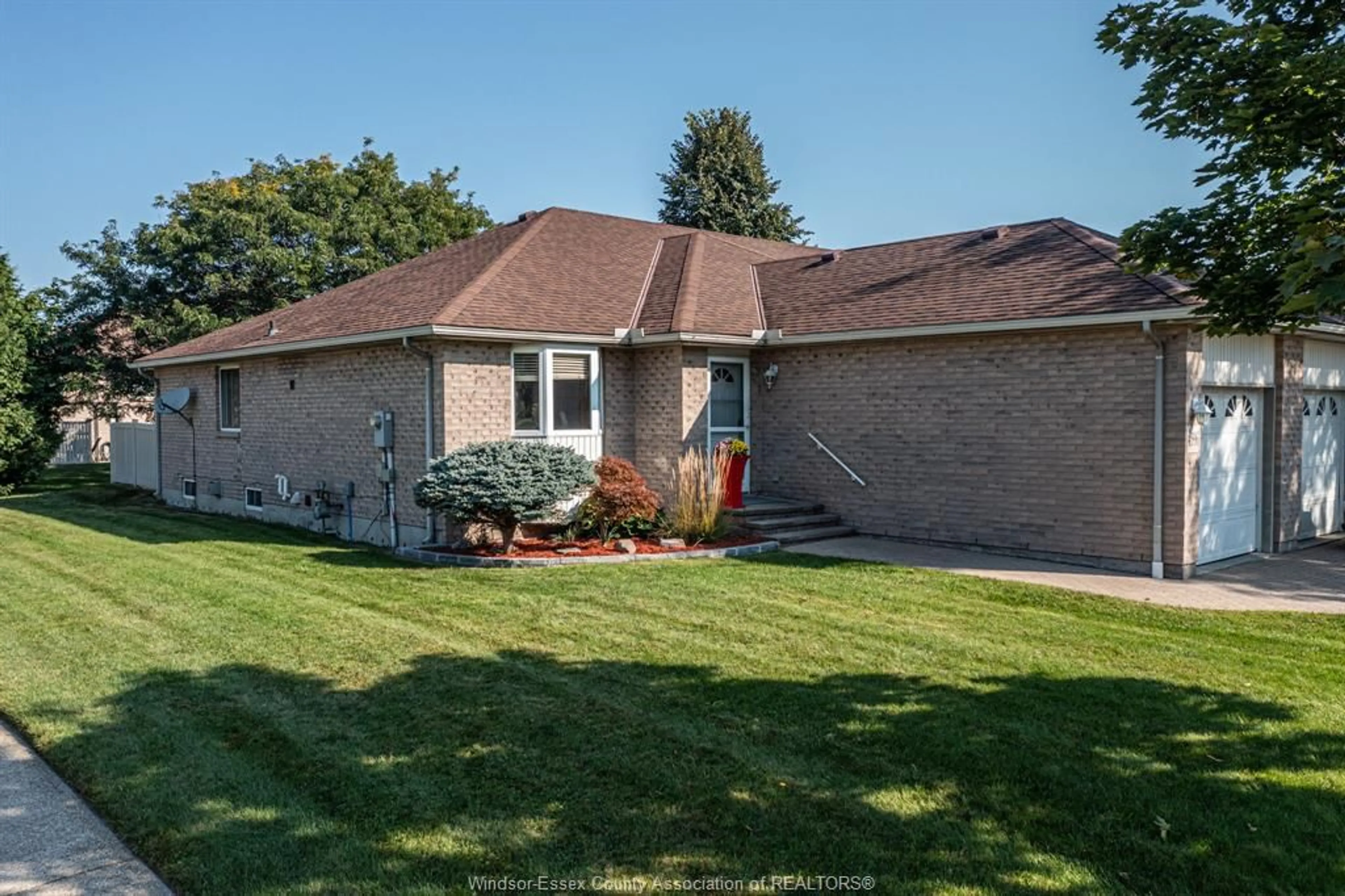 Frontside or backside of a home, the fenced backyard for 4596 GAPAM Crt, Windsor Ontario N9G 2W5