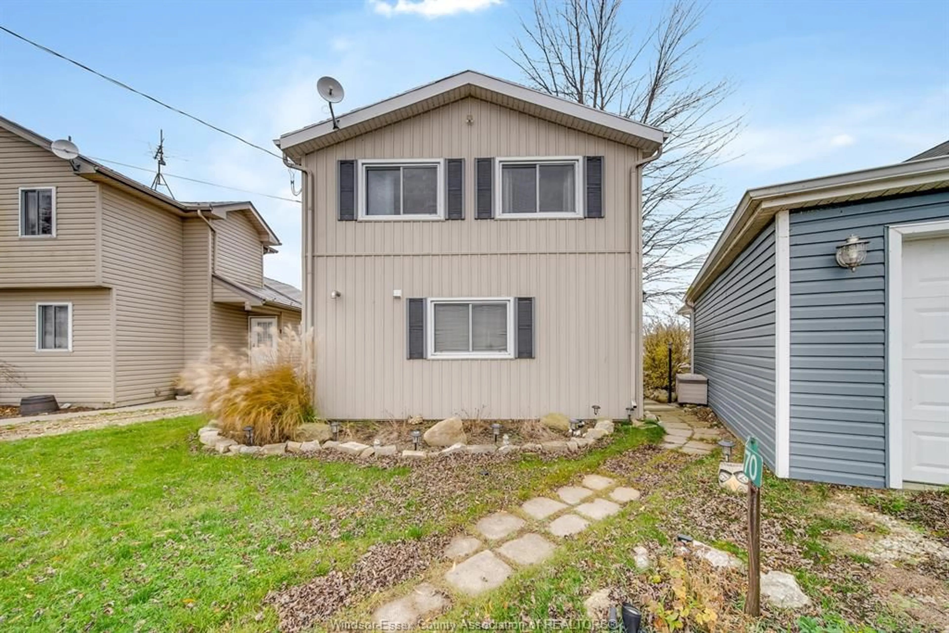 Frontside or backside of a home, the fenced backyard for 18170 ERIE SHORE Dr, Erieau Ontario N0P 1A0