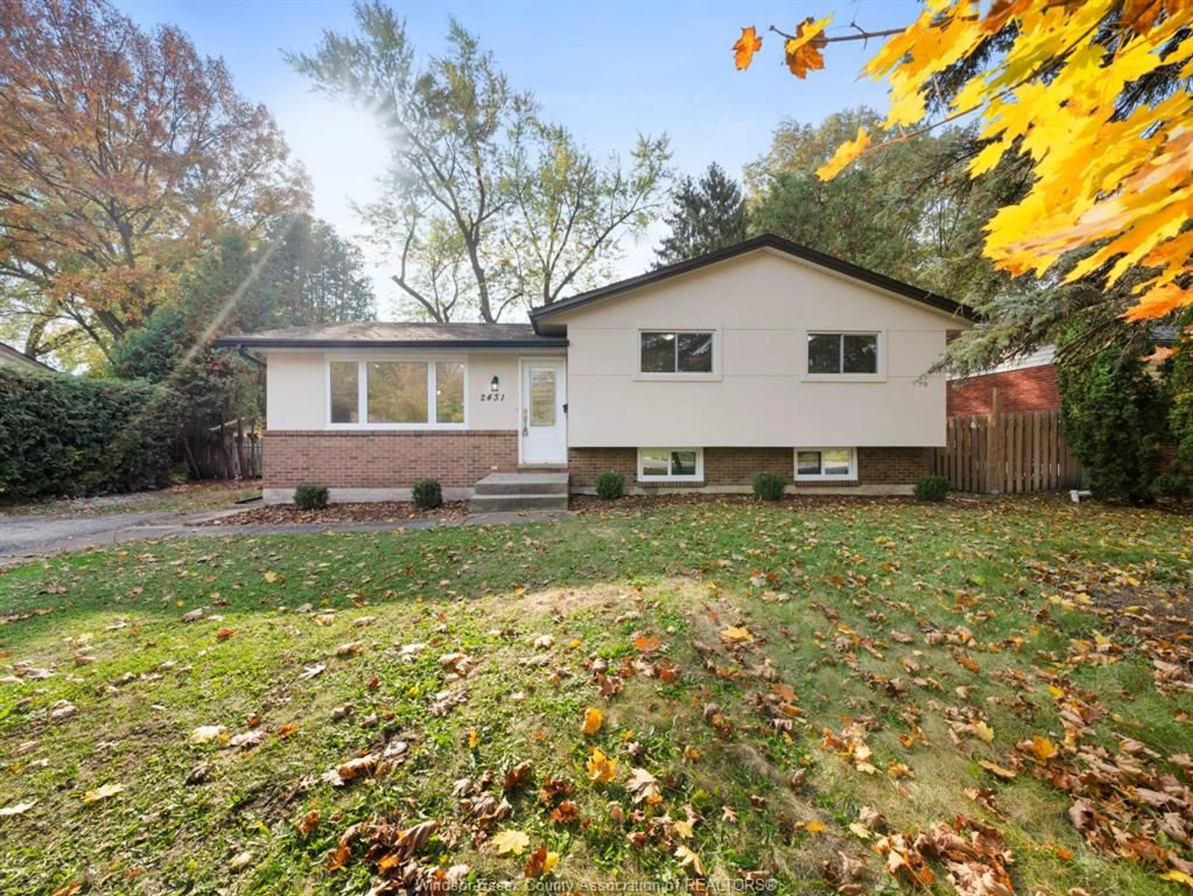 Frontside or backside of a home, the fenced backyard for 2431 TODD Lane, LaSalle Ontario N9H 1K4