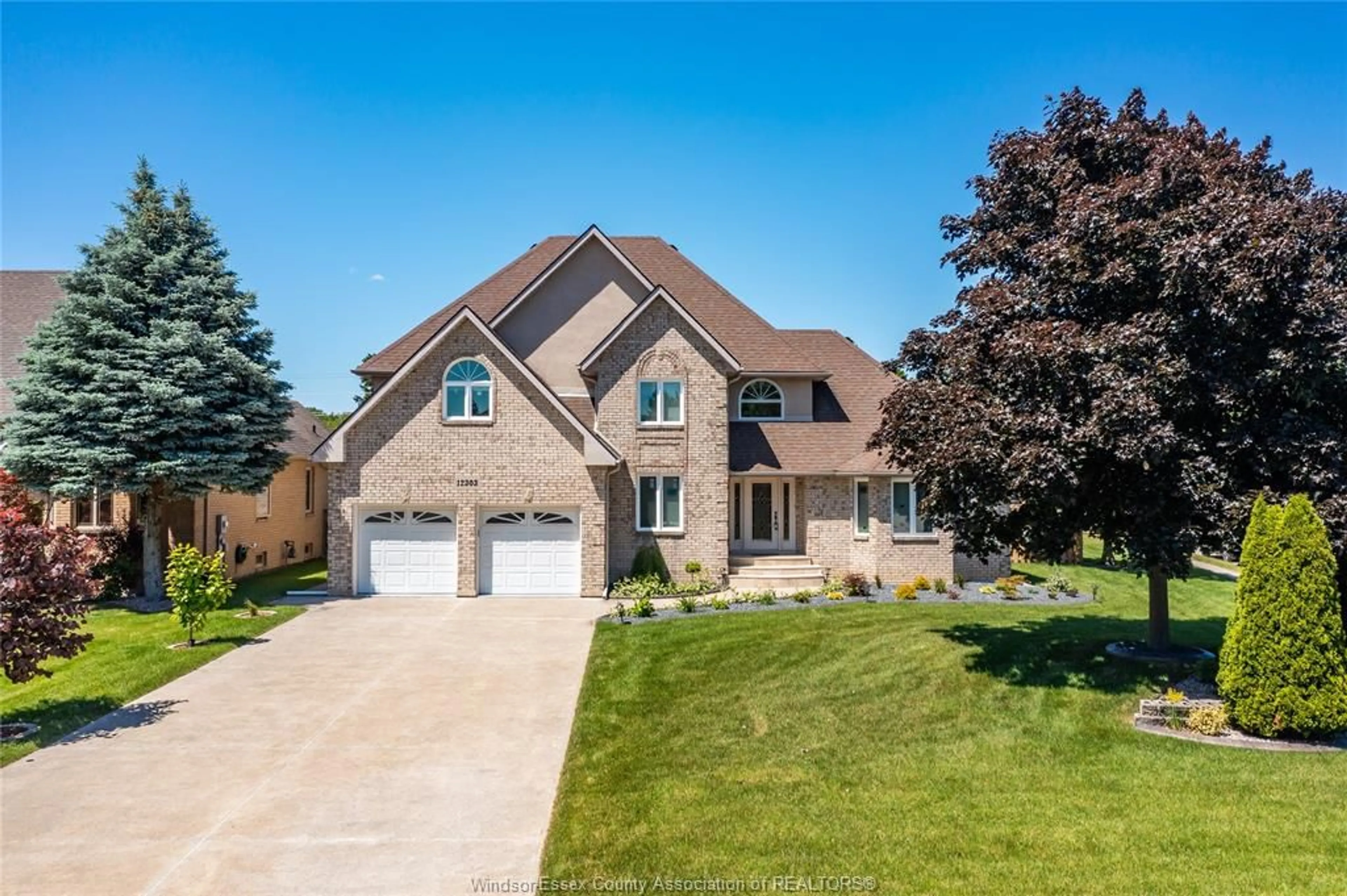 Frontside or backside of a home, the street view for 12303 VICKERY Lane, Tecumseh Ontario N9K 1B5