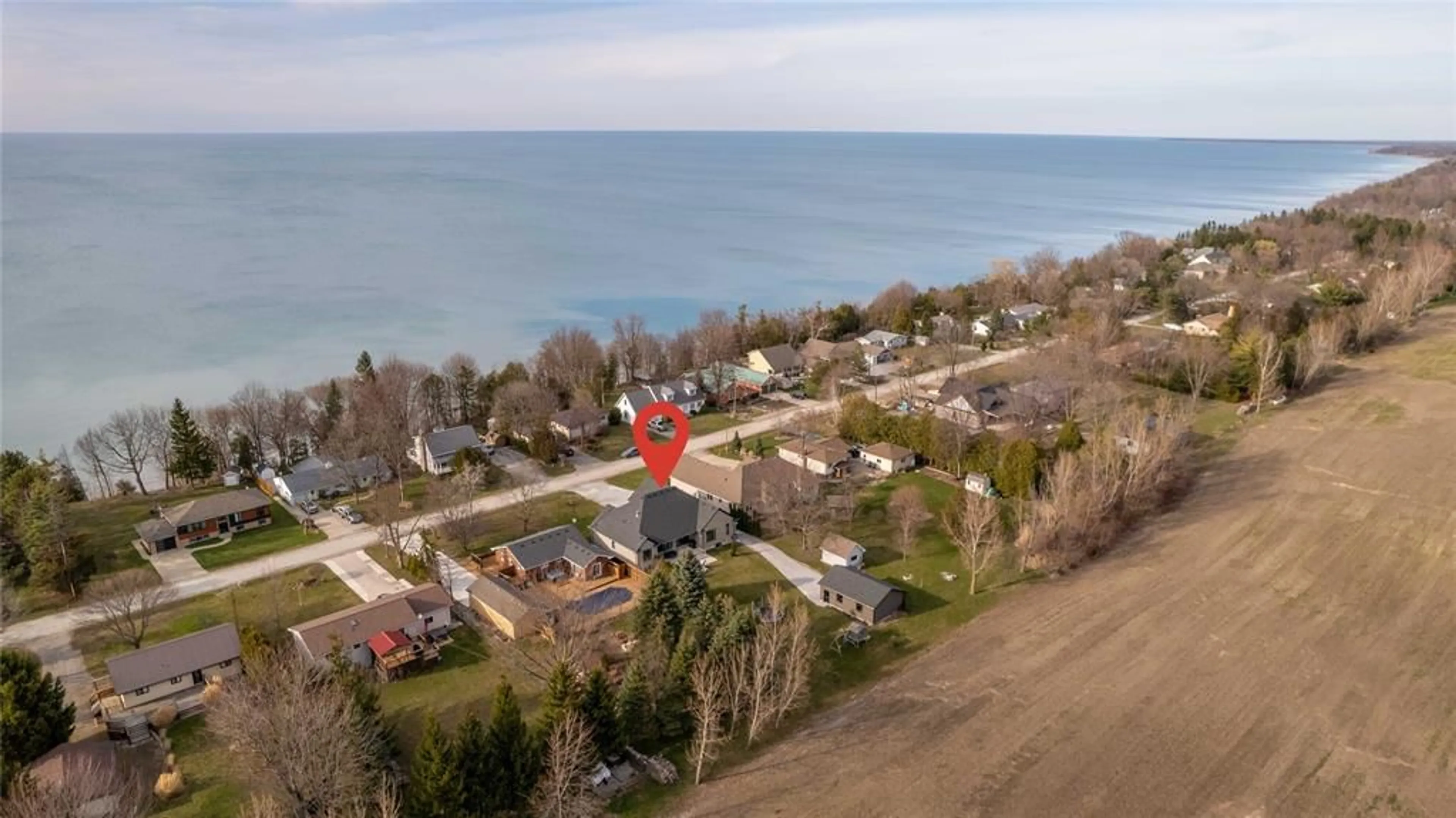 A pic from outside/outdoor area/front of a property/back of a property/a pic from drone, water/lake/river/ocean view for 4657 LAKESIDE St, Plympton-Wyoming Ontario N0N 1J6