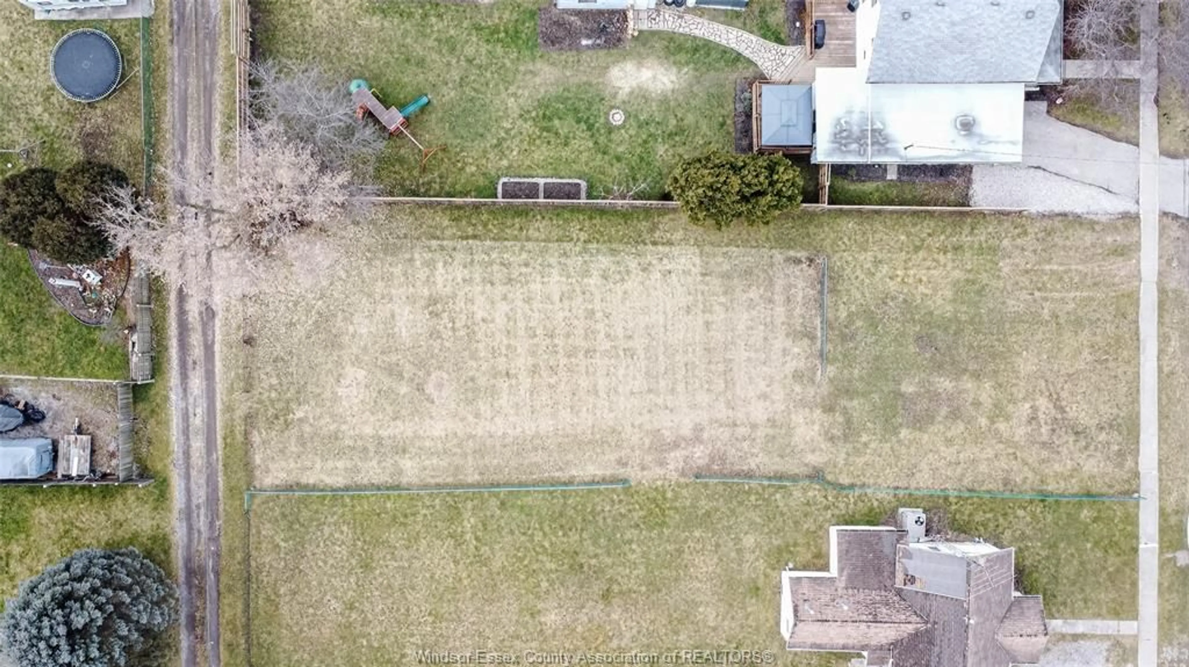 Frontside or backside of a home, the fenced backyard for 1123 ELGIN, Wallaceburg Ontario N8A 3E5