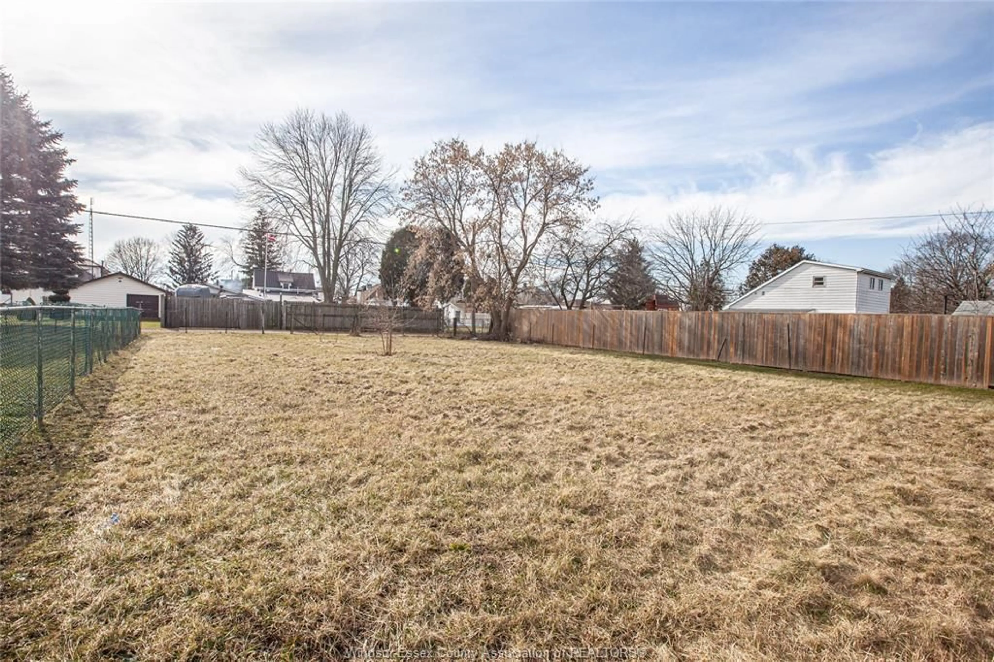 Frontside or backside of a home, the fenced backyard for 1123 ELGIN, Wallaceburg Ontario N8A 3E5