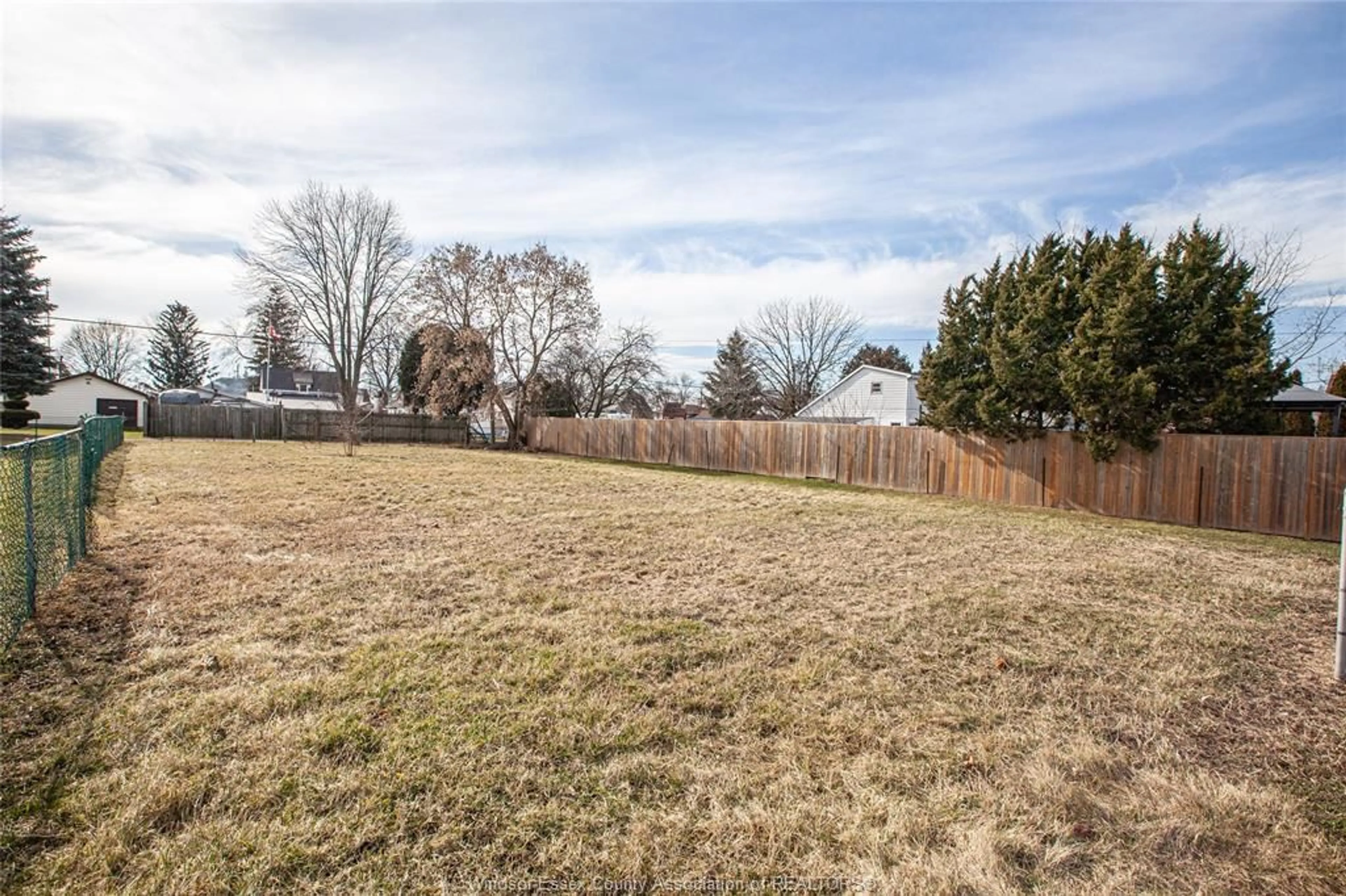 Frontside or backside of a home, the fenced backyard for 1123 ELGIN, Wallaceburg Ontario N8A 3E5