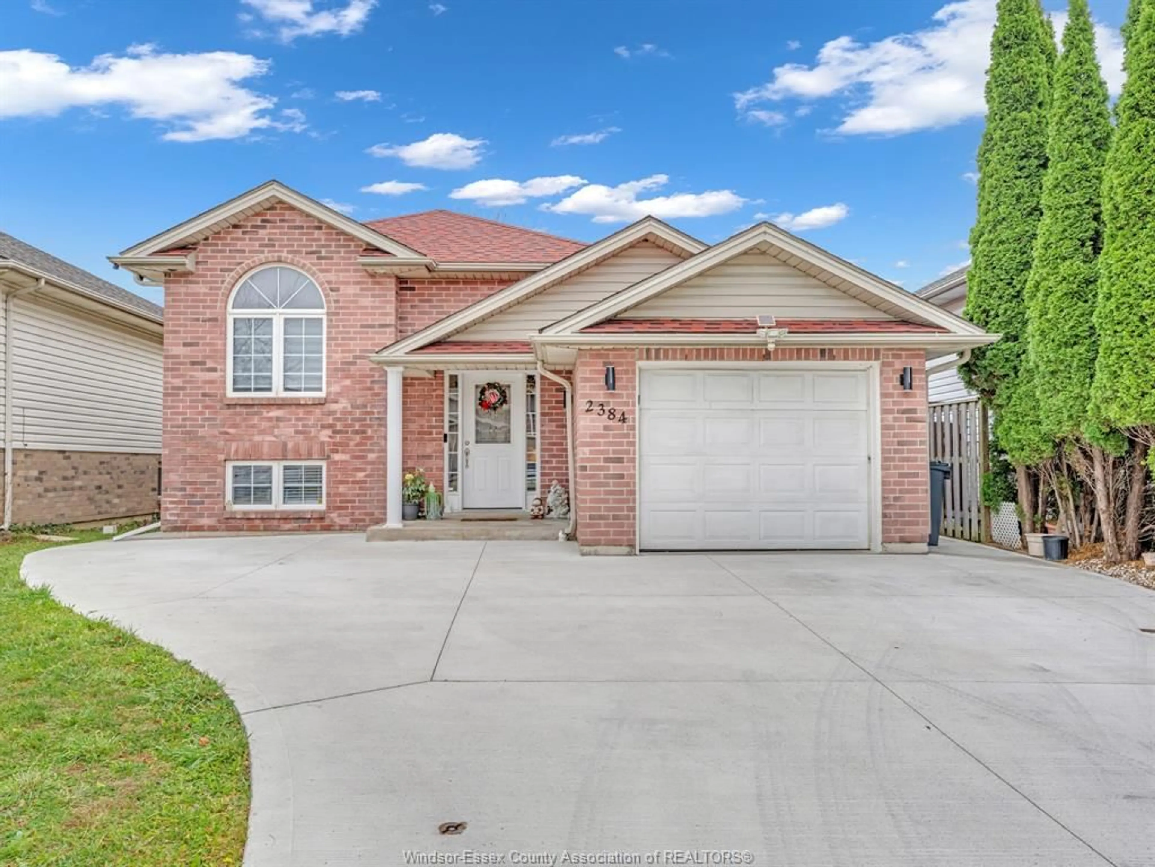 Home with brick exterior material, street for 2384 TRAPPERS Ave, Windsor Ontario N8P 1N4