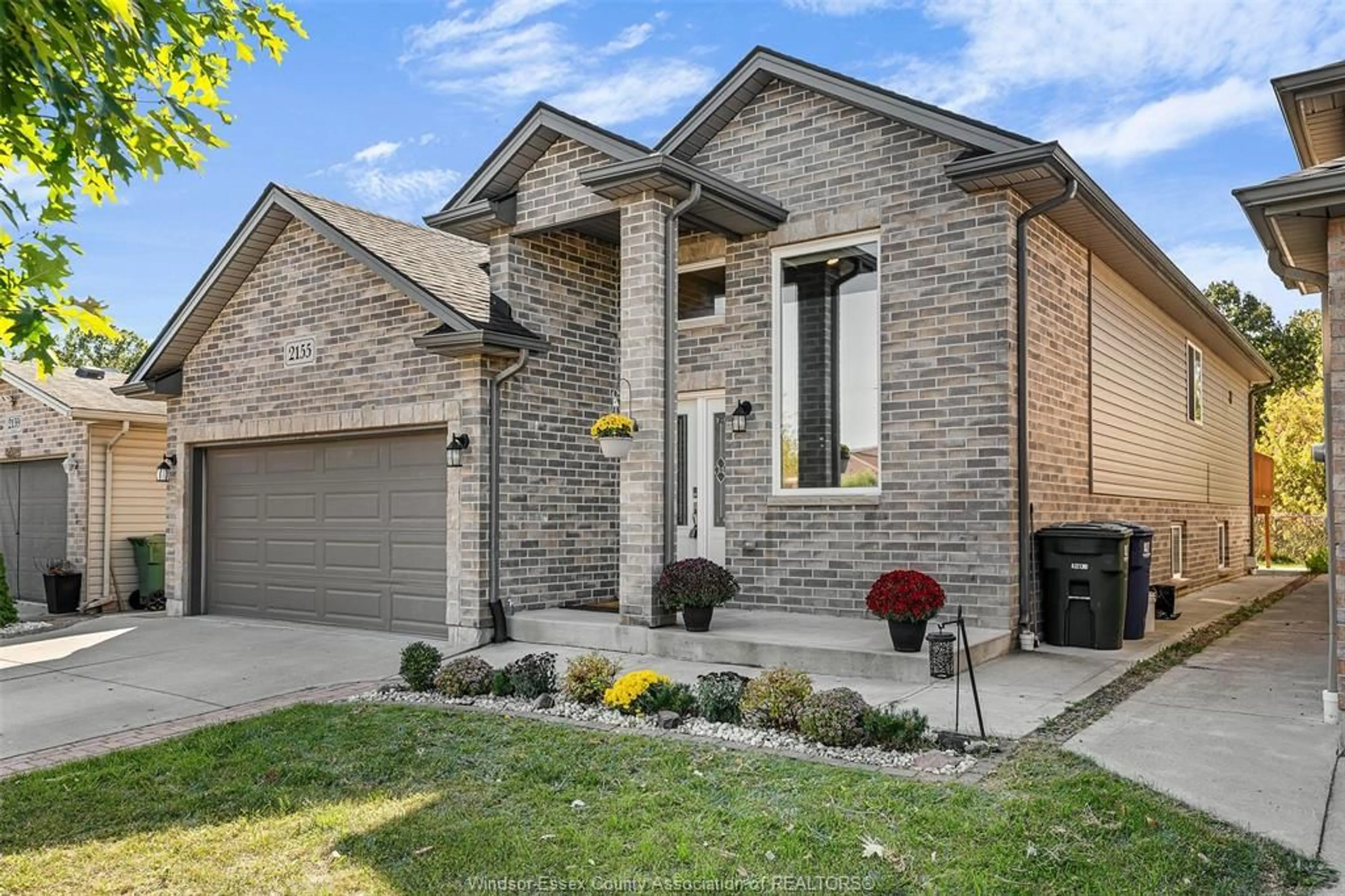 Home with brick exterior material, street for 2155 Mark, Windsor Ontario N9B 3X6