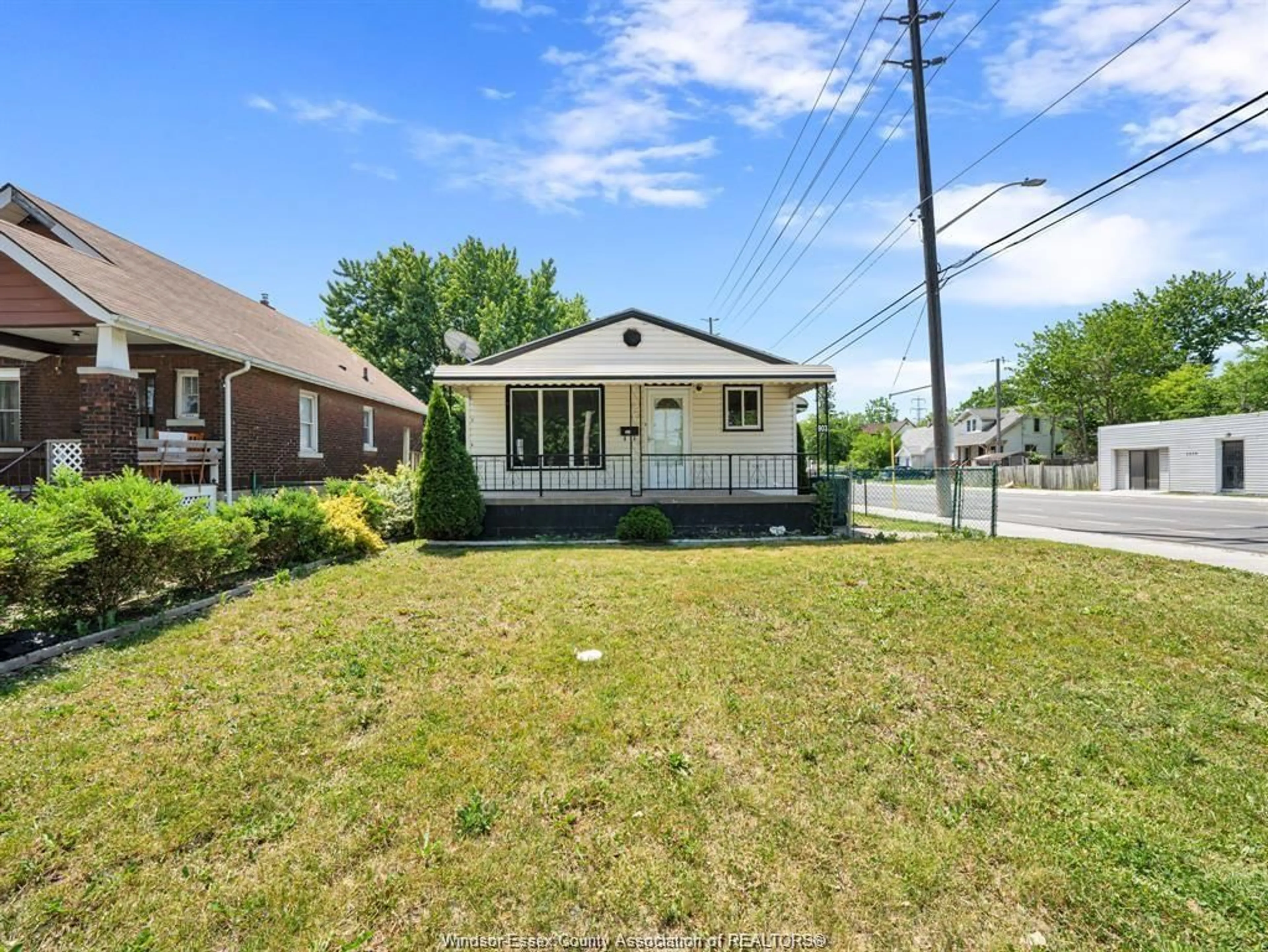 A pic from outside/outdoor area/front of a property/back of a property/a pic from drone, street for 903 Curry Avenue, Windsor Ontario N9B 2C3