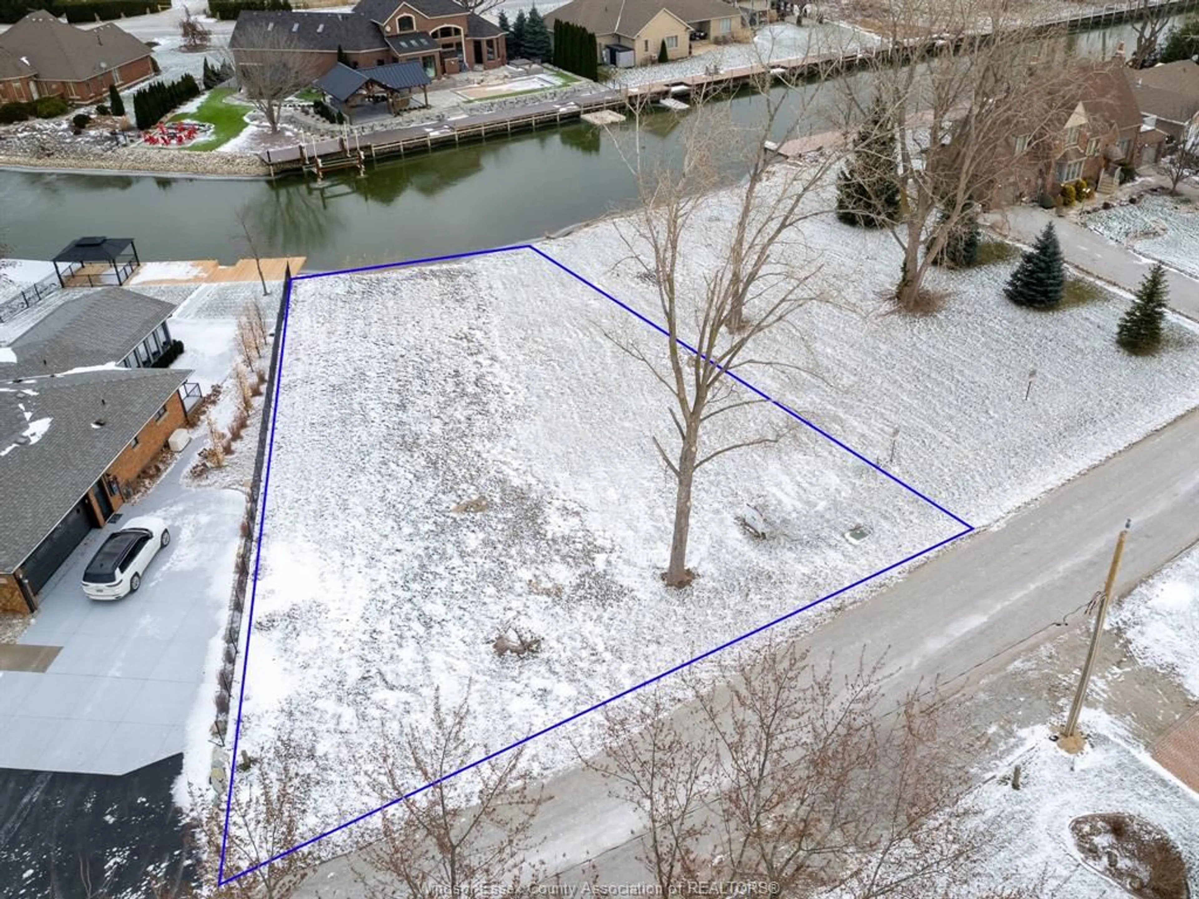 A pic from outside/outdoor area/front of a property/back of a property/a pic from drone, water/lake/river/ocean view for 19080 LIGHTCOVE Ave, Lakeshore Ontario N0P 2L0