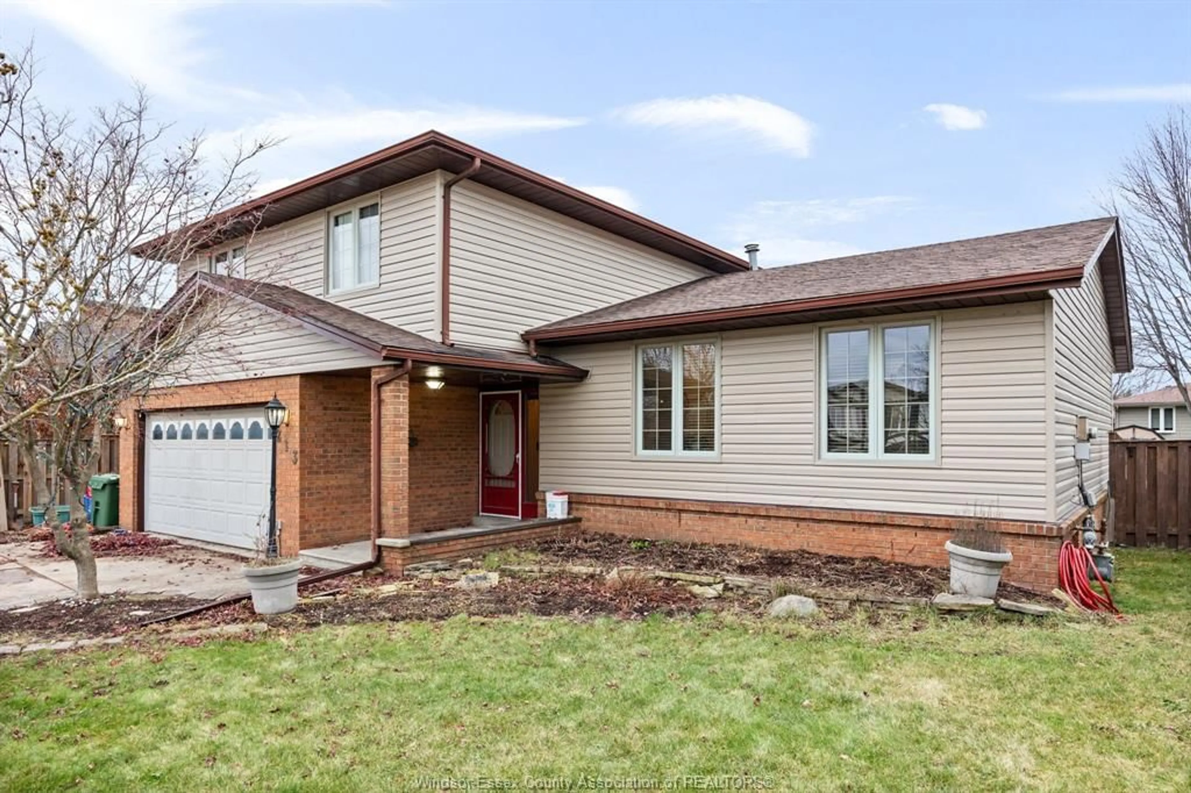 Home with brick exterior material, street for 213 WEDGEWOOD, Tecumseh Ontario N8N 4J4