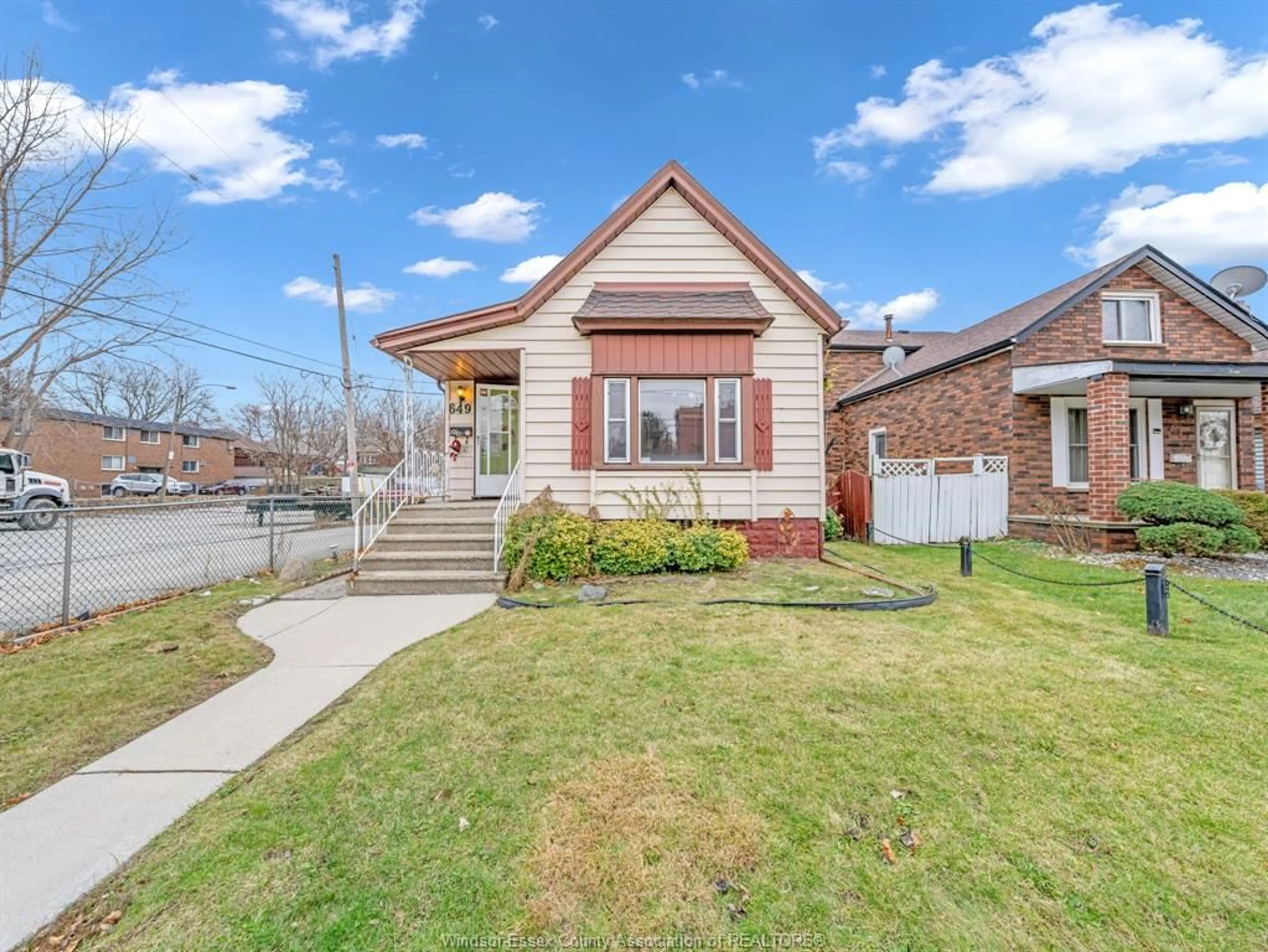 Home with brick exterior material, street for 649 CATARAQUI St, Windsor Ontario N9V 3P2