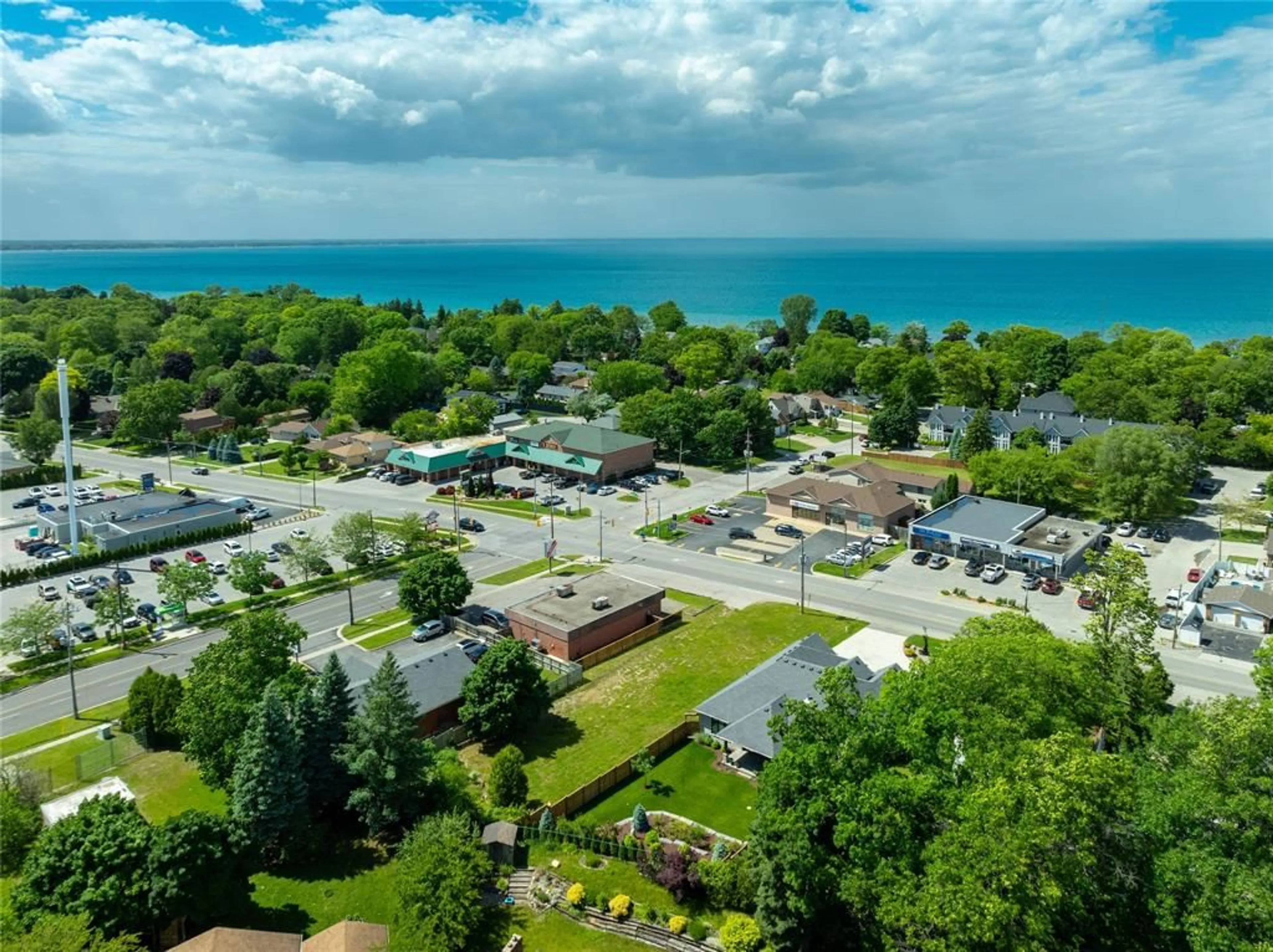 A pic from outside/outdoor area/front of a property/back of a property/a pic from drone, water/lake/river/ocean view for 1207 LAKESHORE Rd, Sarnia Ontario N7S 2L1
