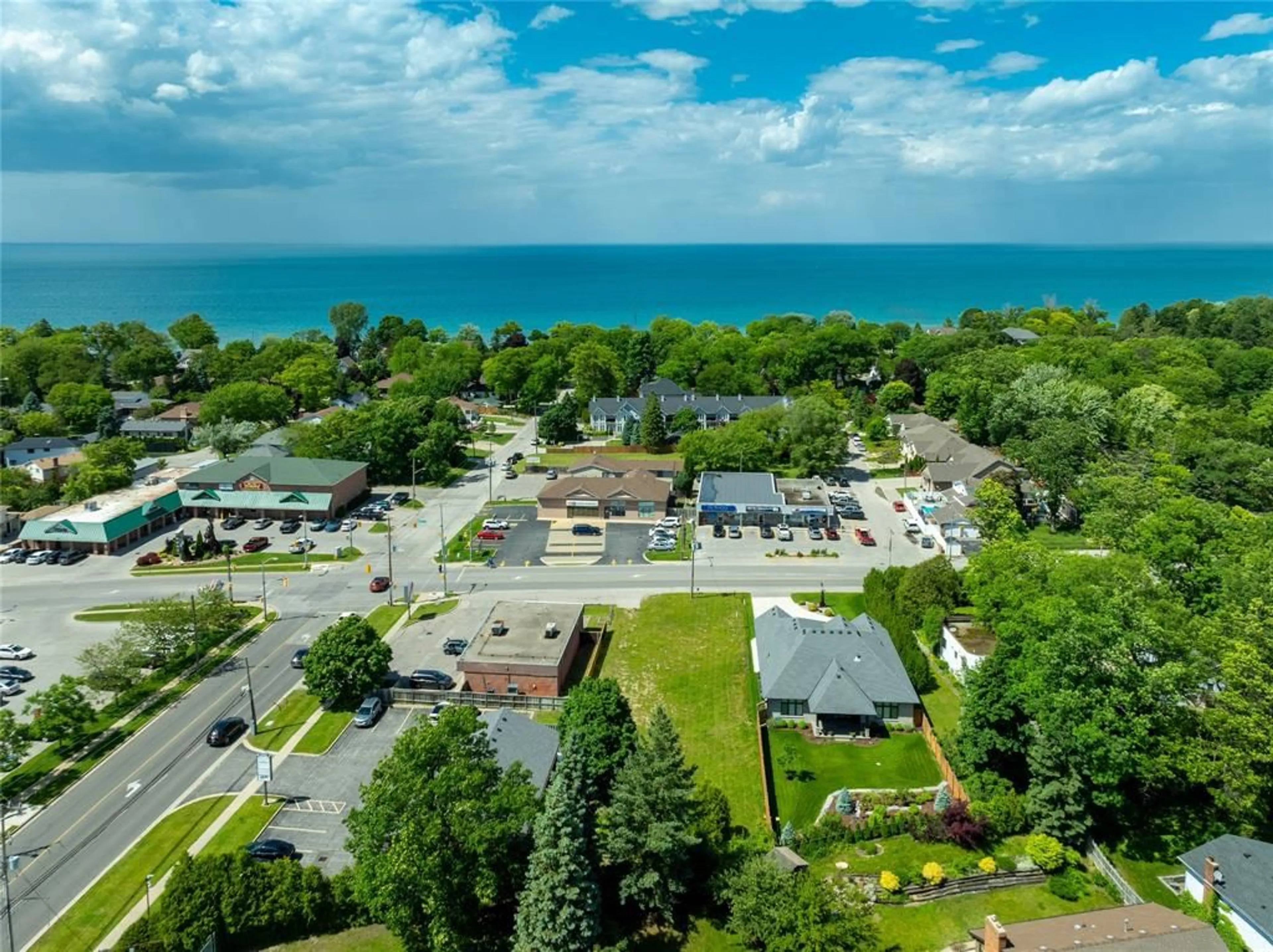 A pic from outside/outdoor area/front of a property/back of a property/a pic from drone, water/lake/river/ocean view for 1207 LAKESHORE Rd, Sarnia Ontario N7S 2L1