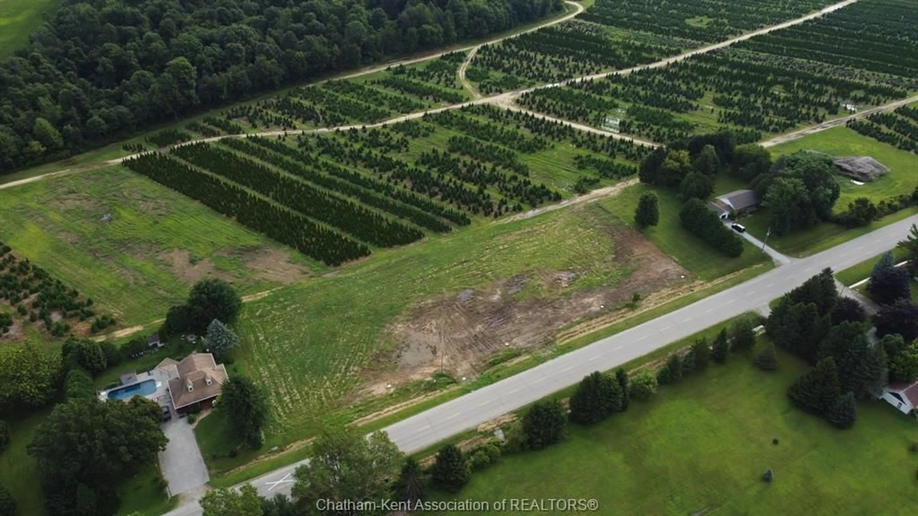 A pic from outside/outdoor area/front of a property/back of a property/a pic from drone, forest/trees view for 15013 MAIN Line, Bothwell Ontario N0P 1C0