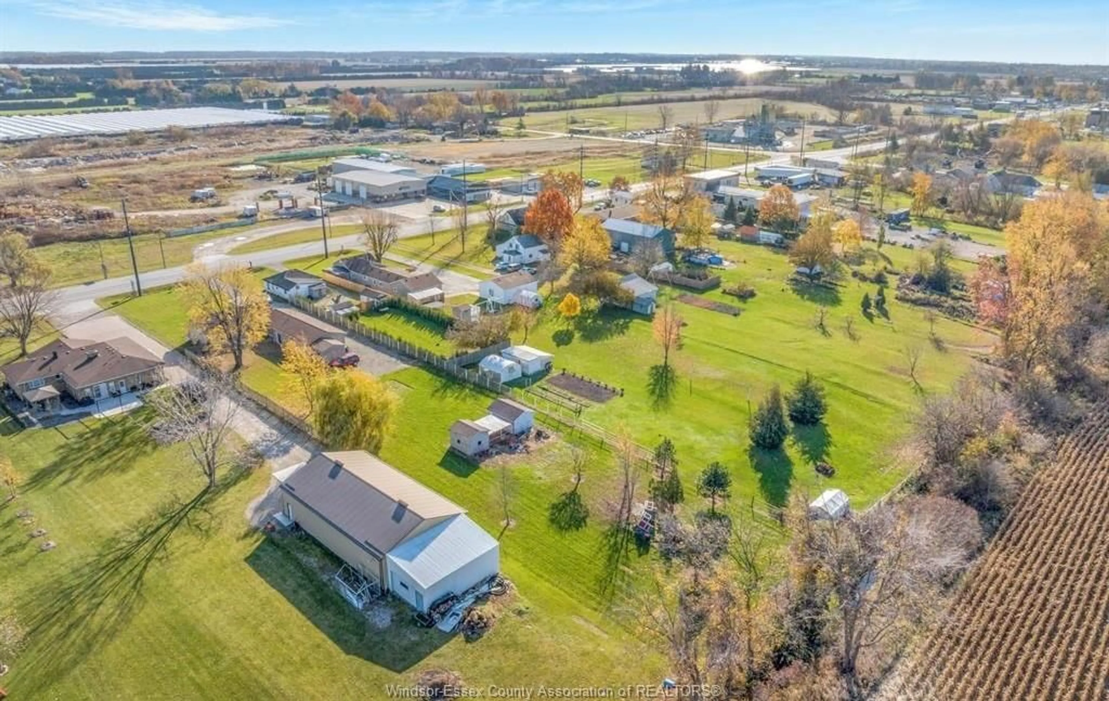 A pic from outside/outdoor area/front of a property/back of a property/a pic from drone, water/lake/river/ocean view for 525 HIGHWAY 77, Leamington Ontario N8H 3V8